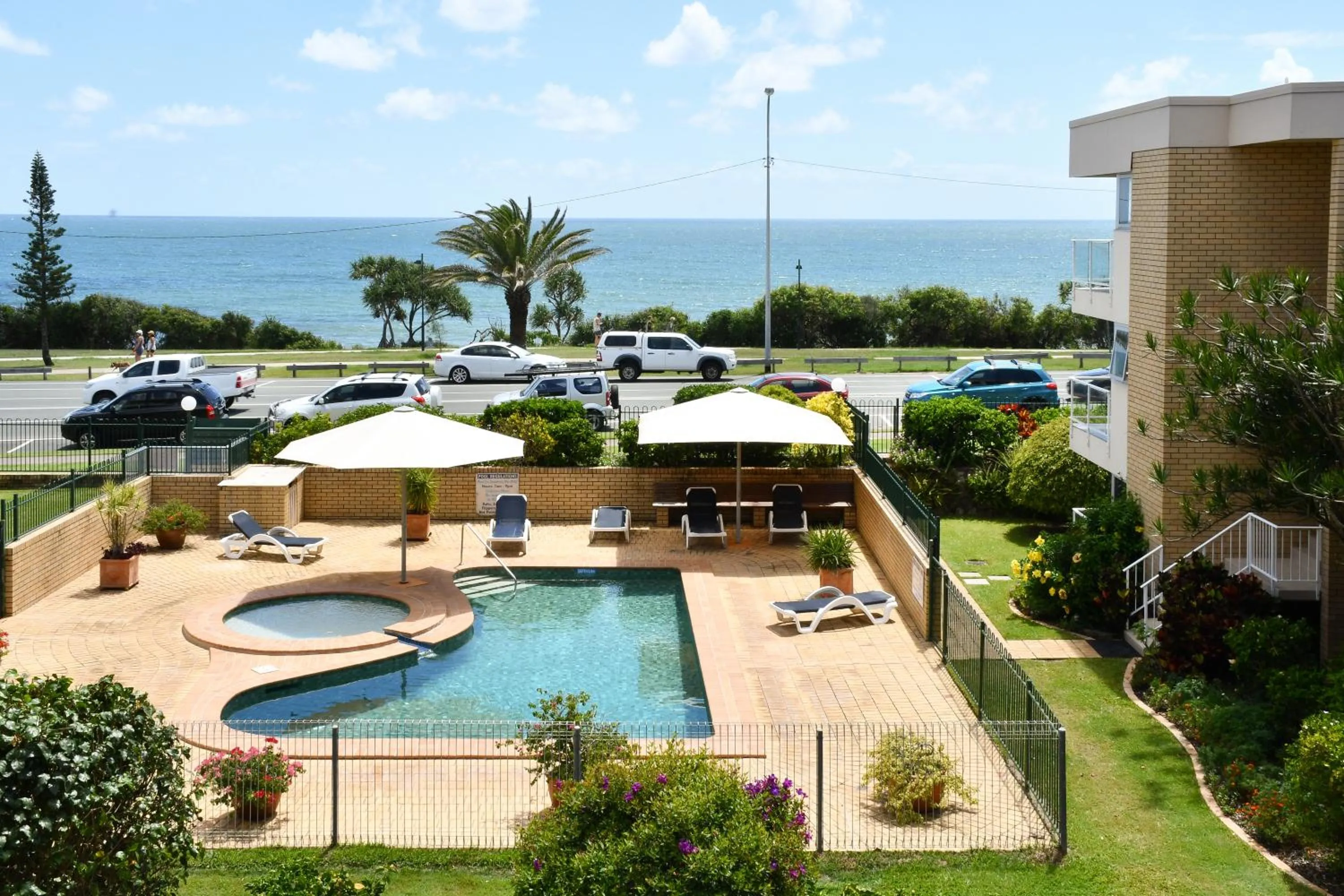 Property building in 2 Bedroom Top Floor Unit - Ocean Views and Pool- Headlands Resort