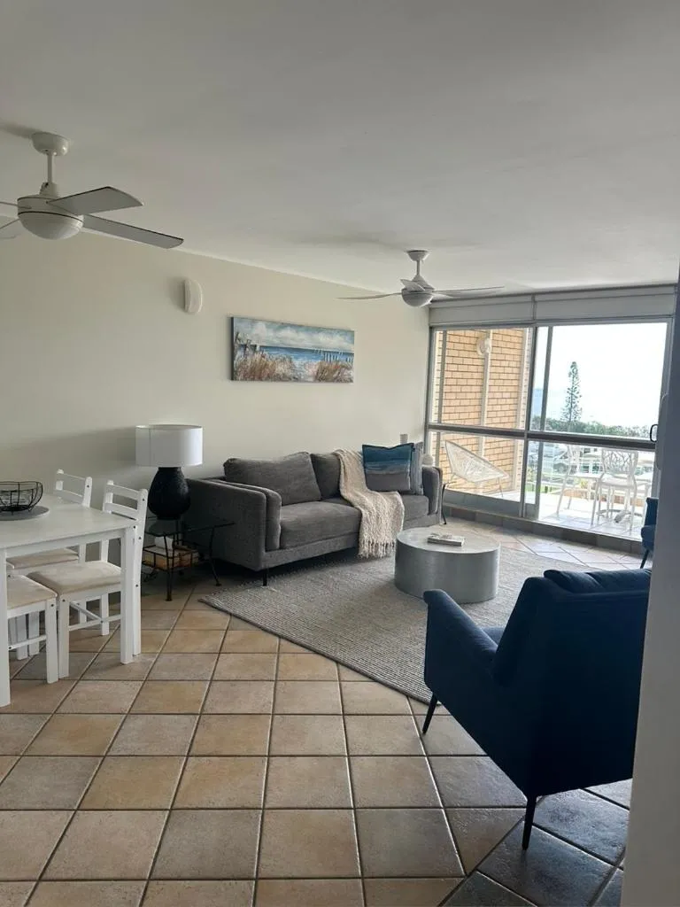 Living room in 2 Bedroom Top Floor Unit - Ocean Views and Pool- Headlands Resort