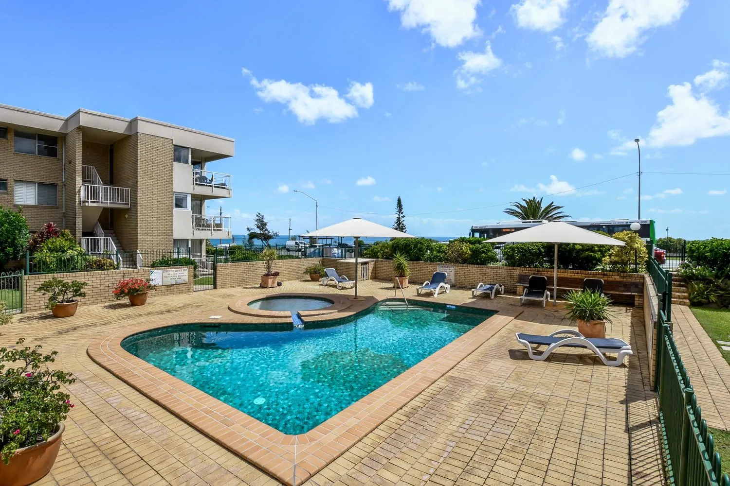 Property building in 2 Bedroom Top Floor Unit - Ocean Views and Pool- Headlands Resort