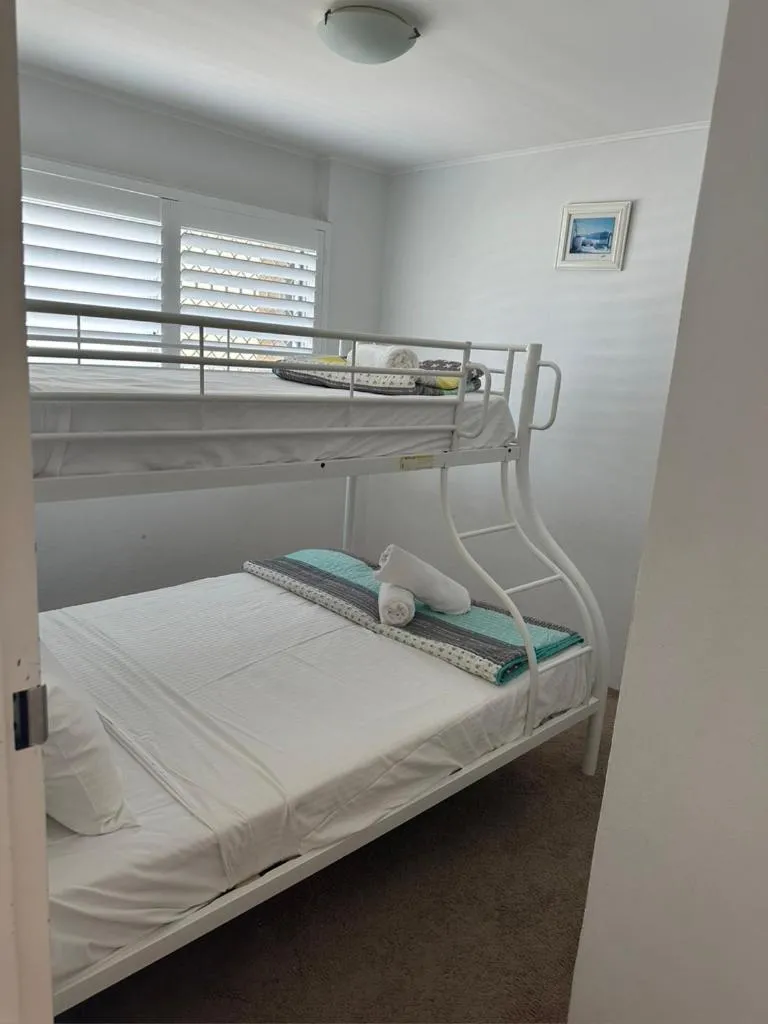 Bed in 2 Bedroom Top Floor Unit - Ocean Views and Pool- Headlands Resort