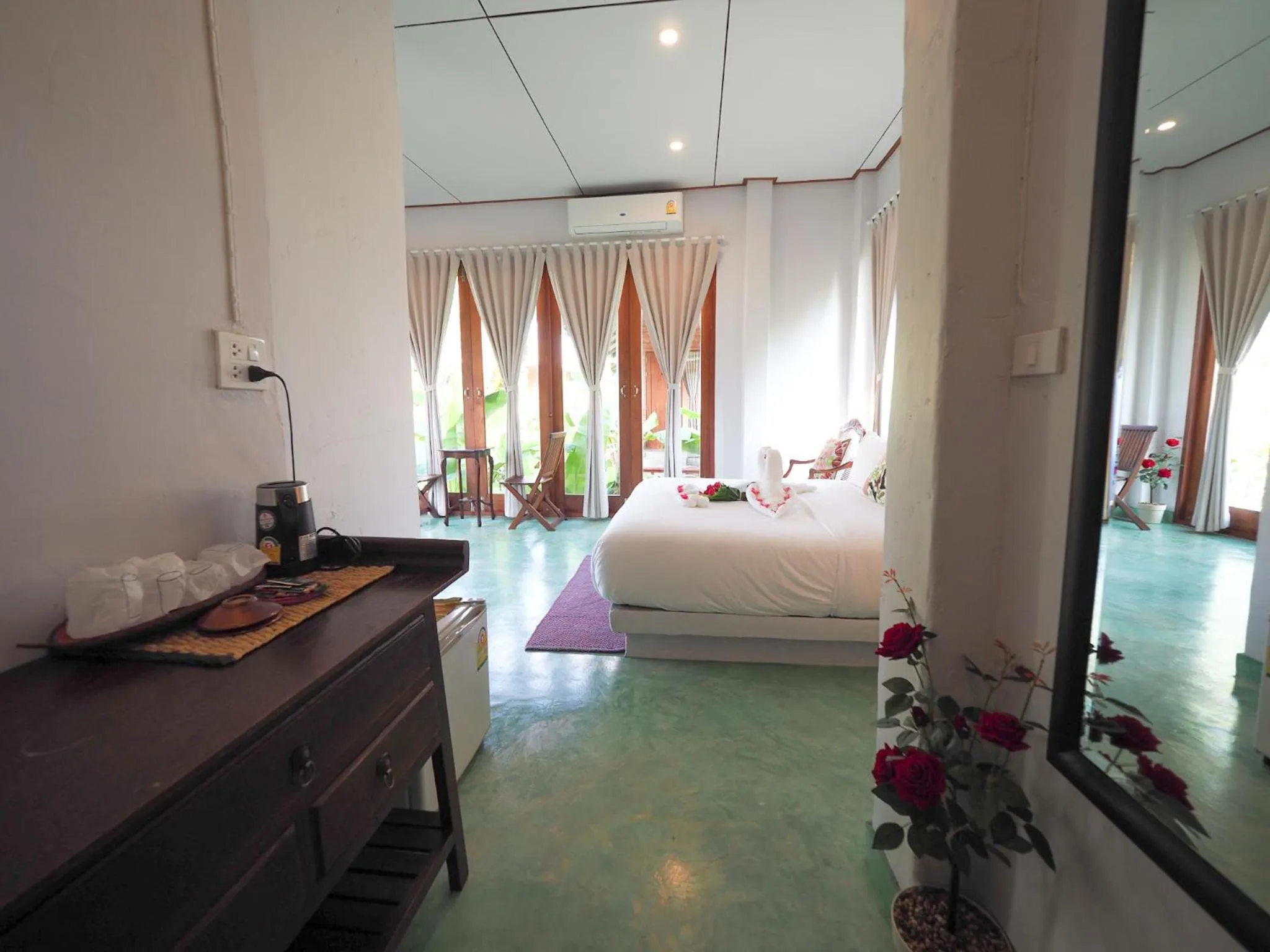 Bed in BaanSuk Sukhothai Resort