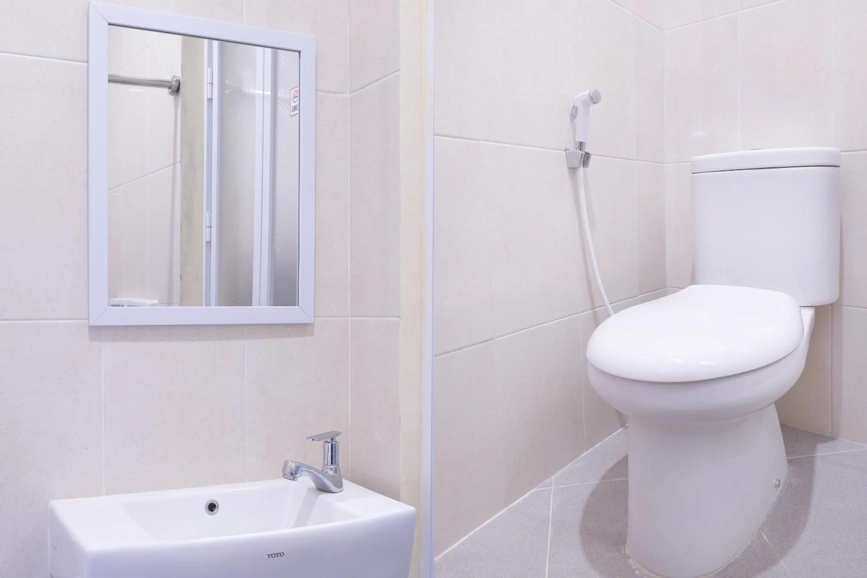 Bathroom in Hotel O DeHome Family