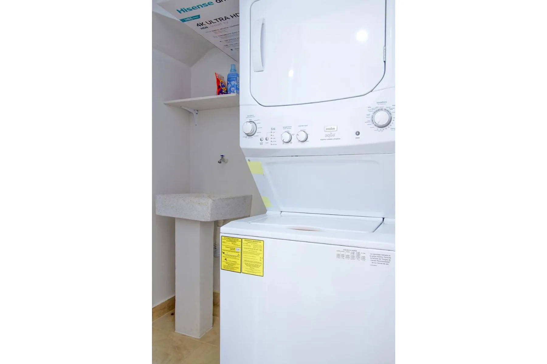 washing machine in Ciudad Mayakoba Homes by Vimex