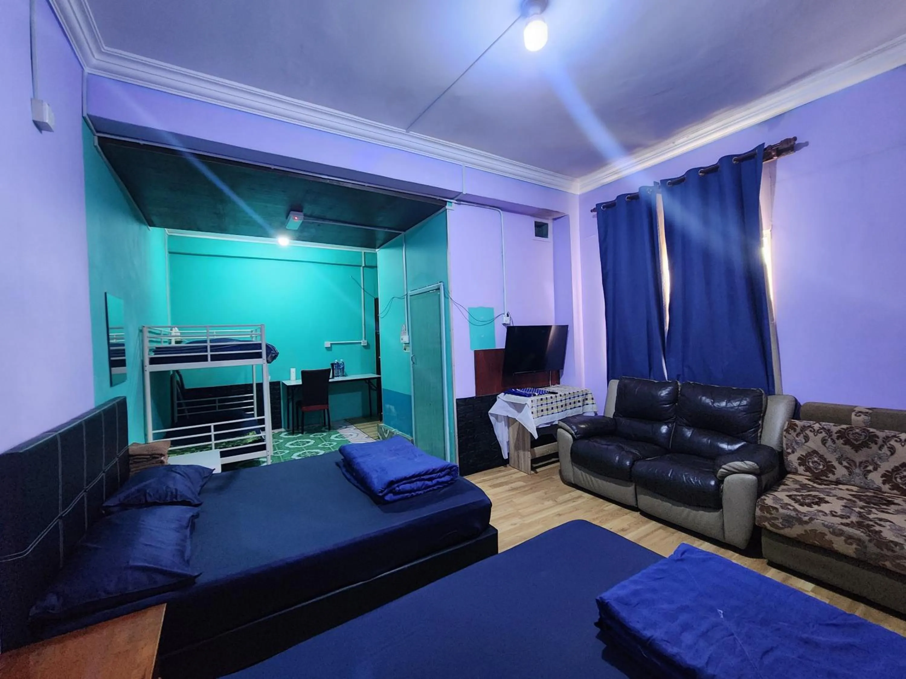 Communal lounge/ TV room in Kupi-Kupi & Stay