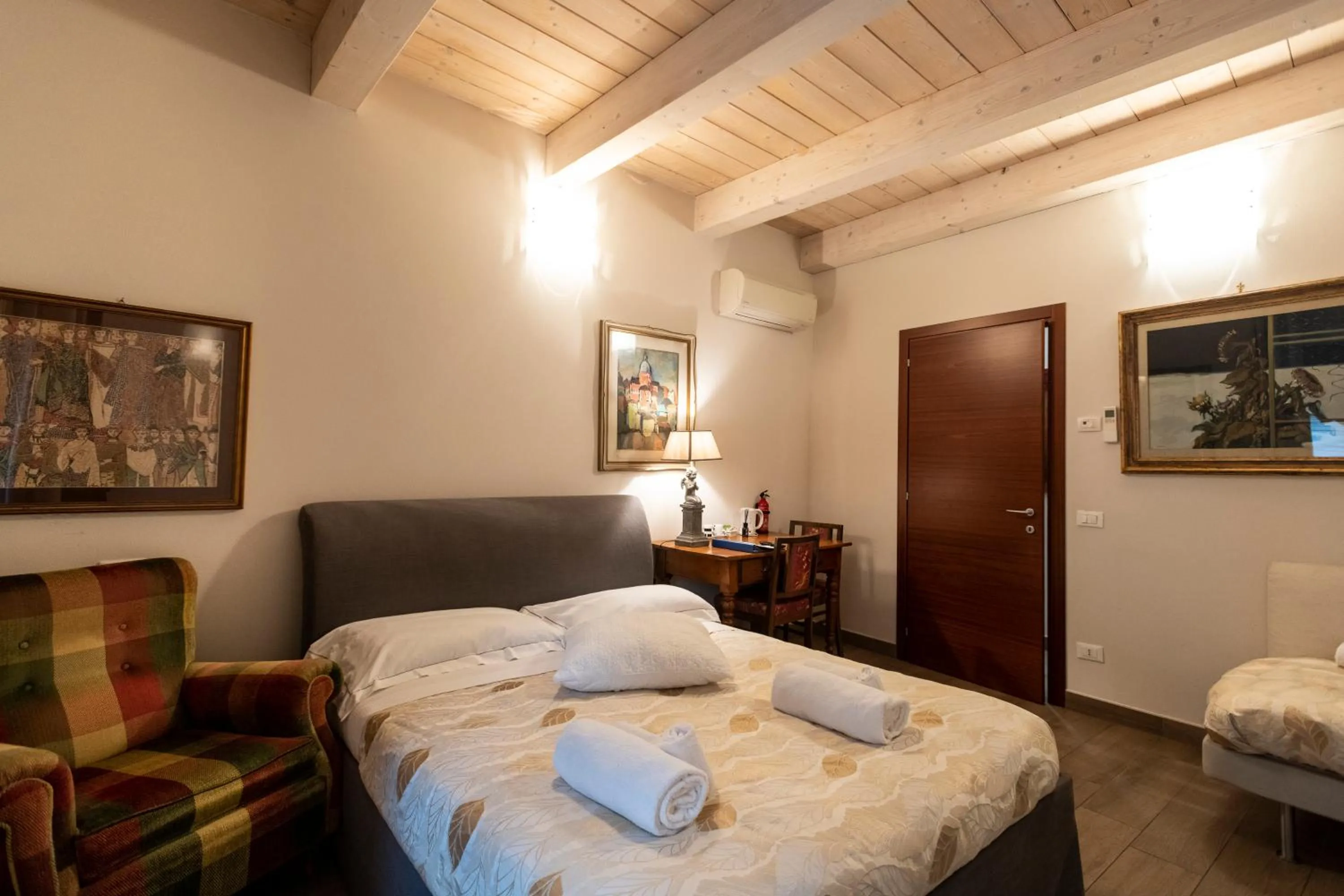 Bed in Al Battistero Luxury Suite