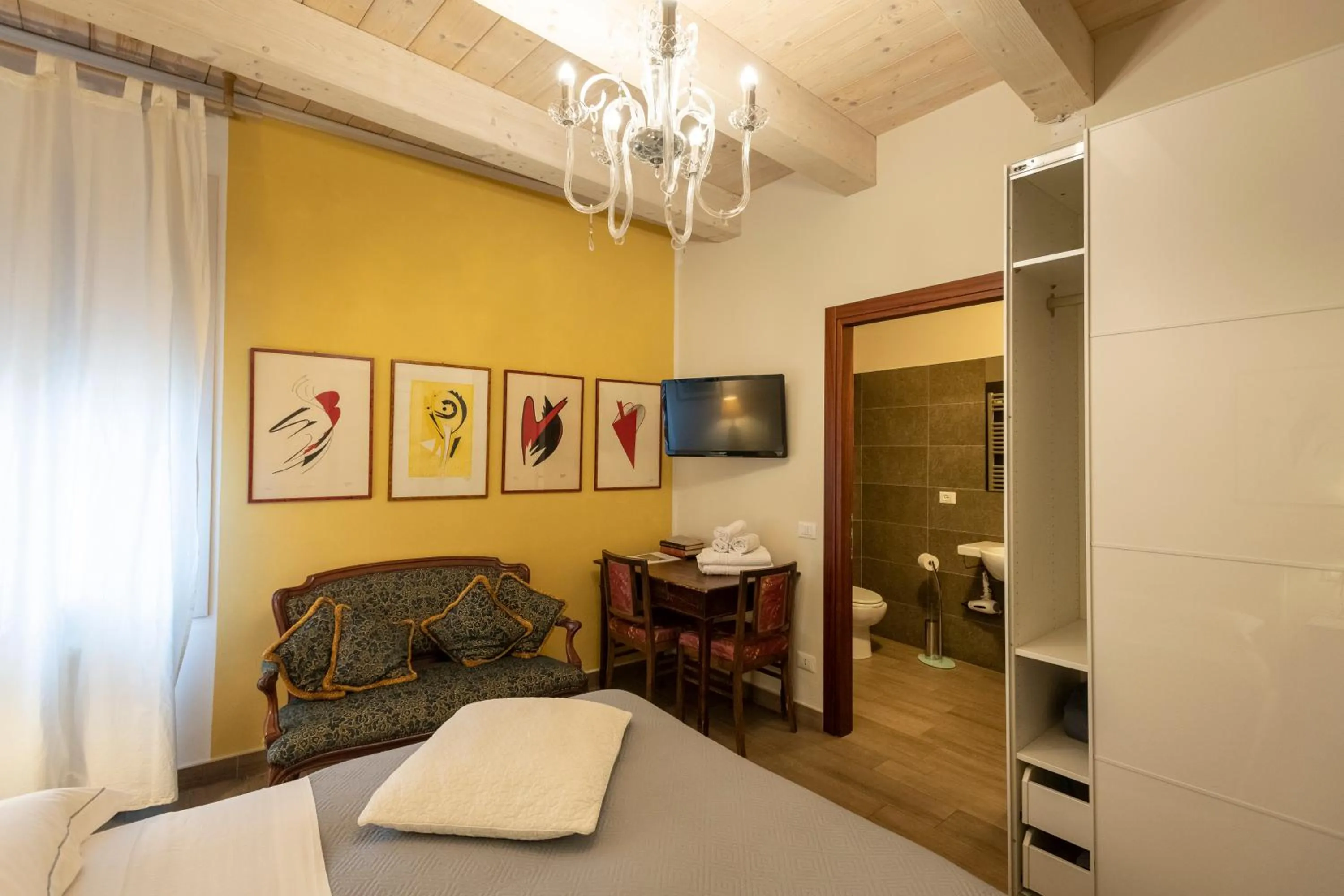 Bed in Al Battistero Luxury Suite