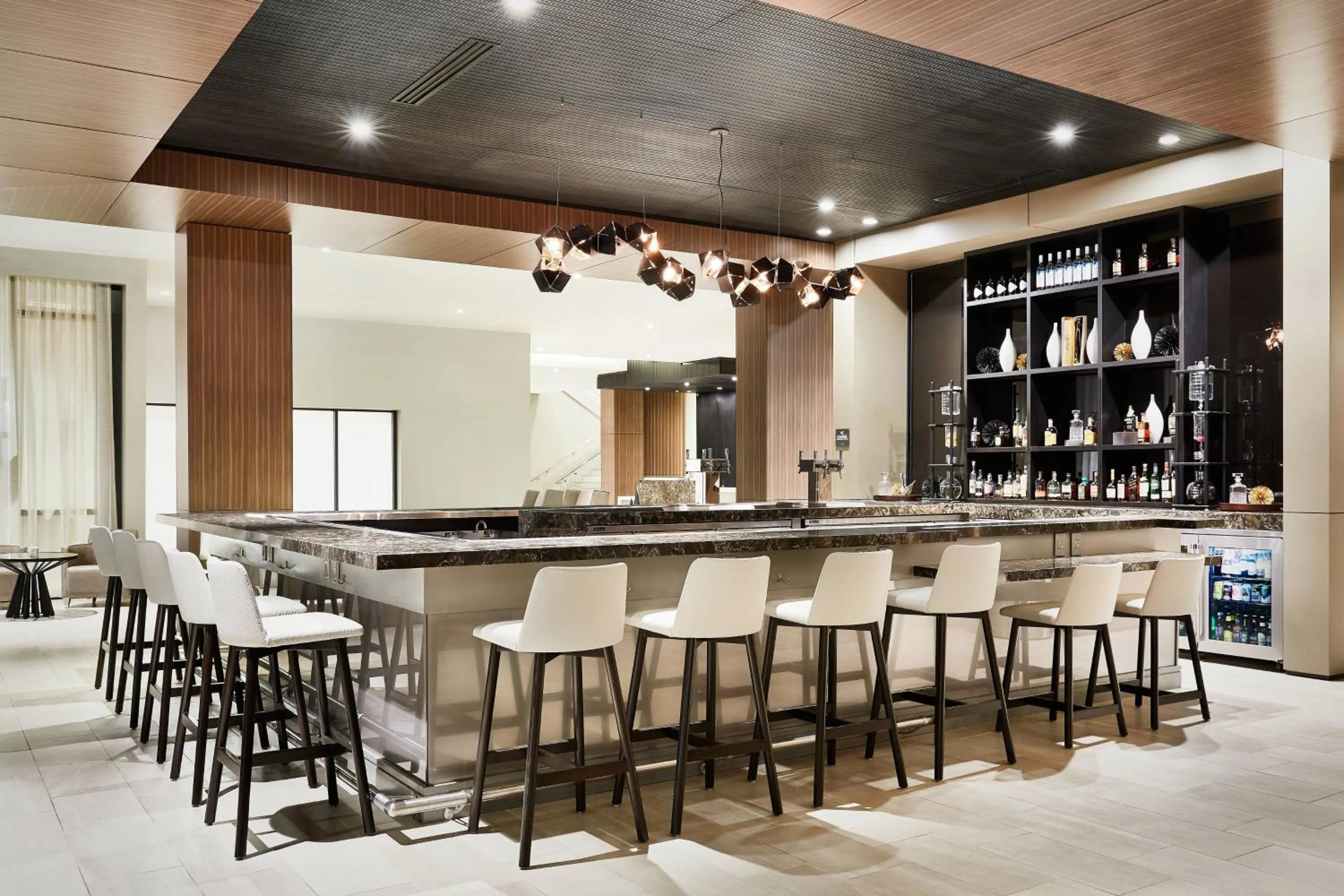 Lounge or bar in AC Hotel by Marriott Huntsville Downtown