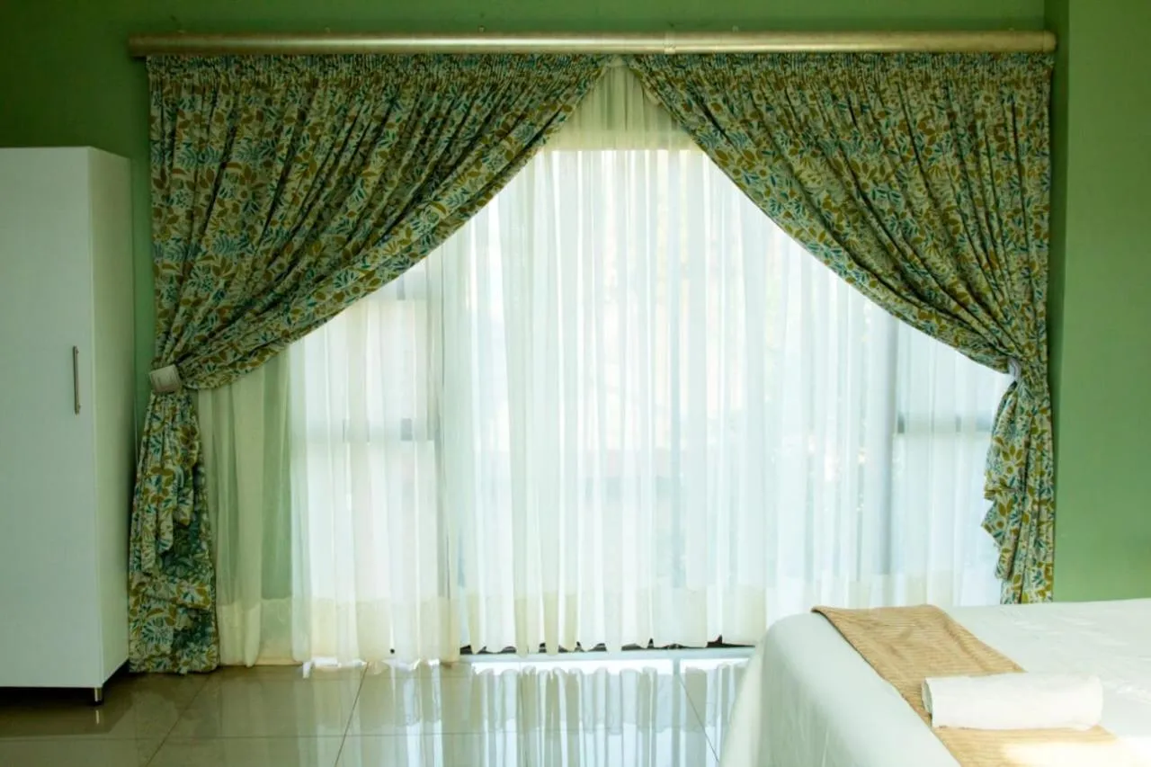 Bed in Vakhusi Guesthouse