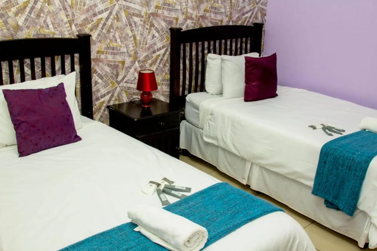 Bed in Vakhusi Guesthouse