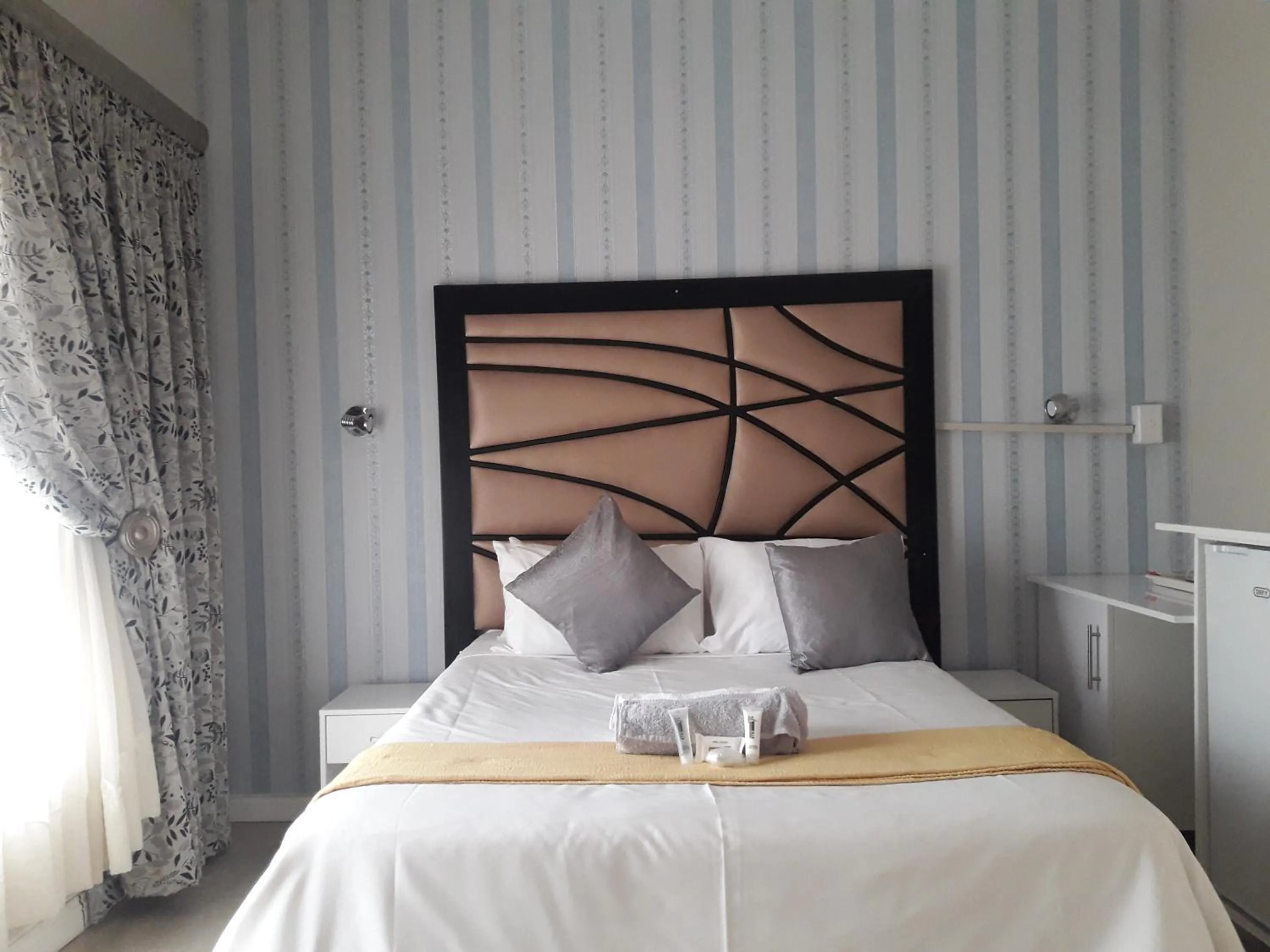 Bed in Vakhusi Guesthouse