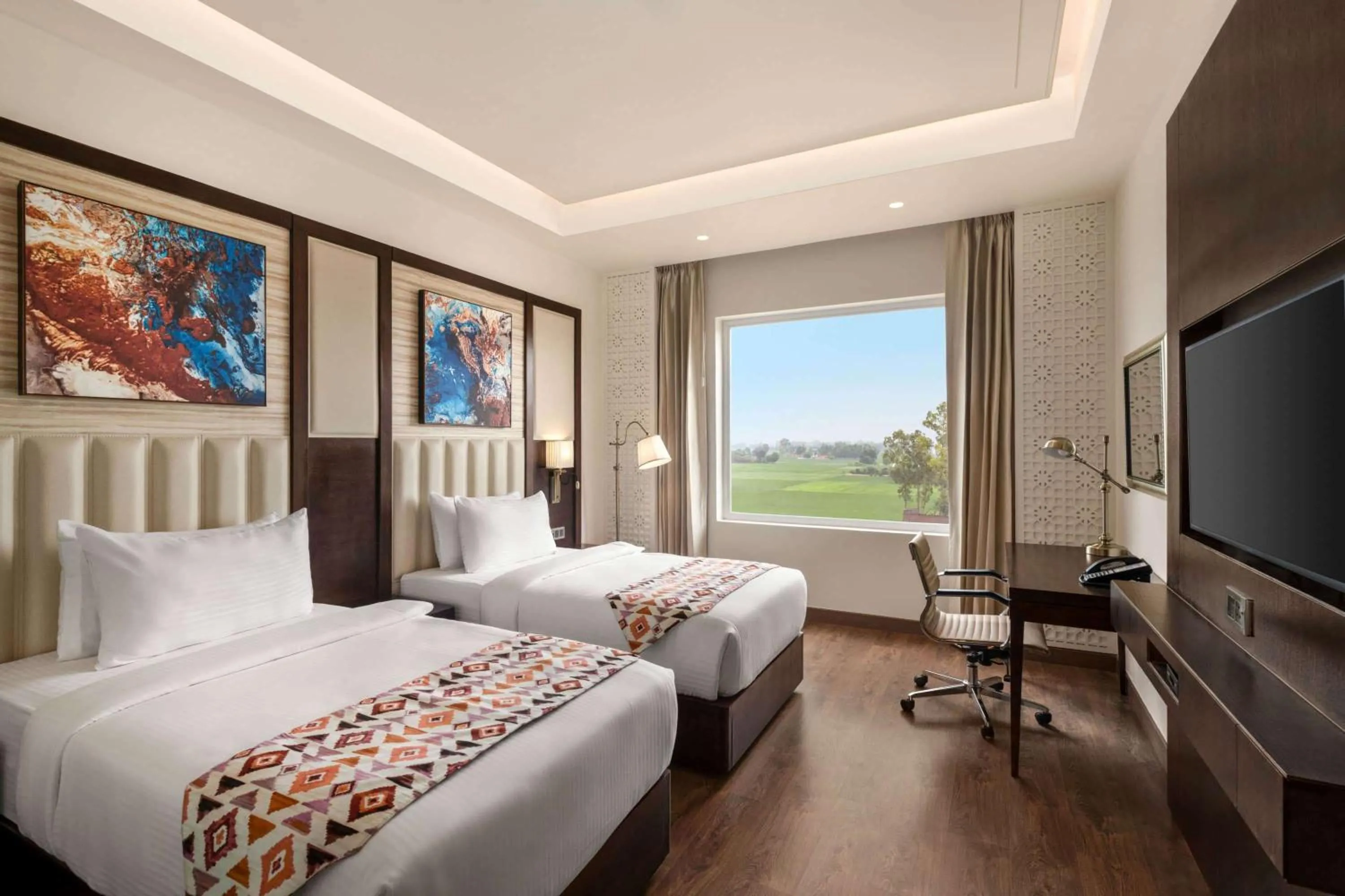 Photo of the whole room, Bed in Ramada by Wyndham Kapurthala