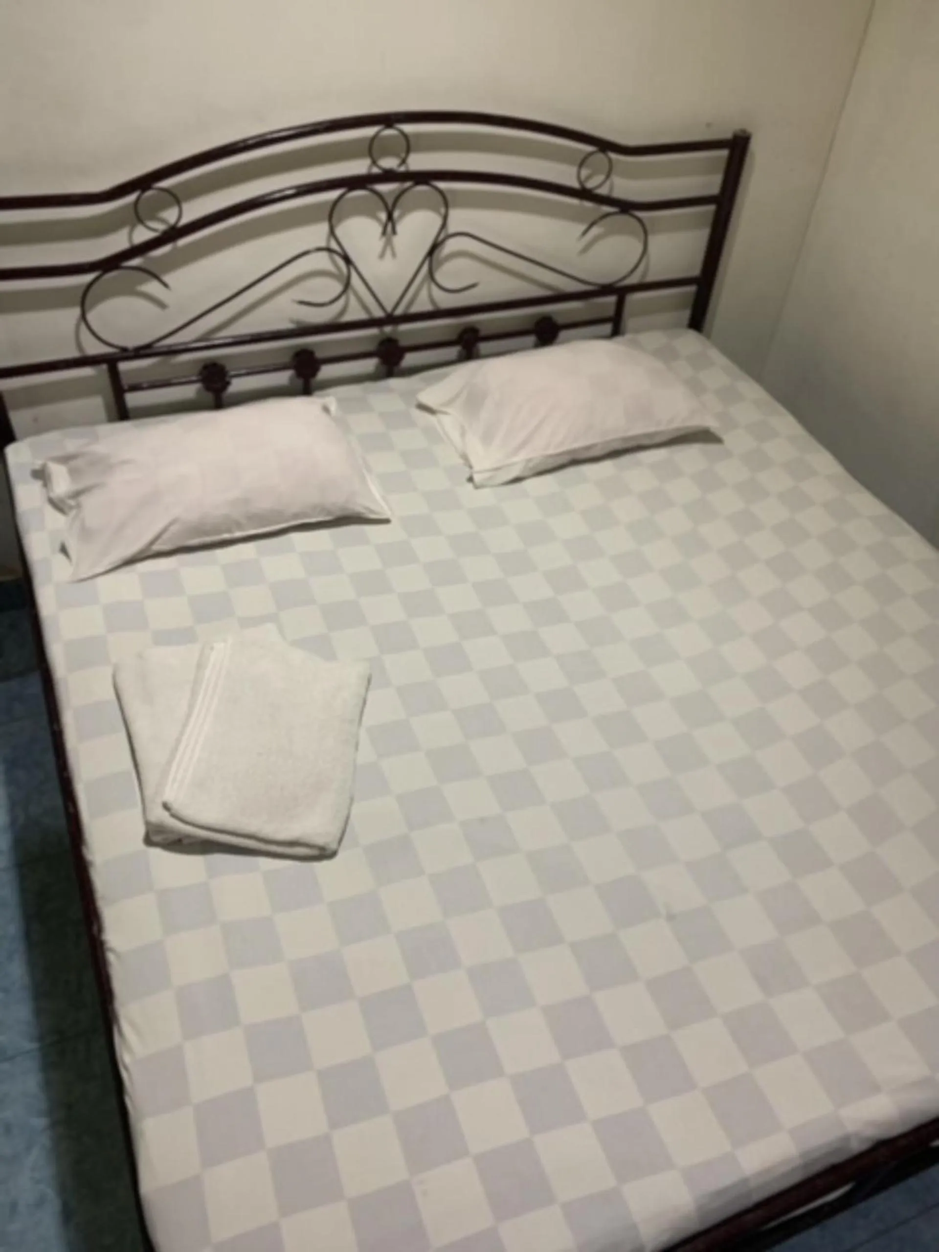 Bed in Hotel Rembulan
