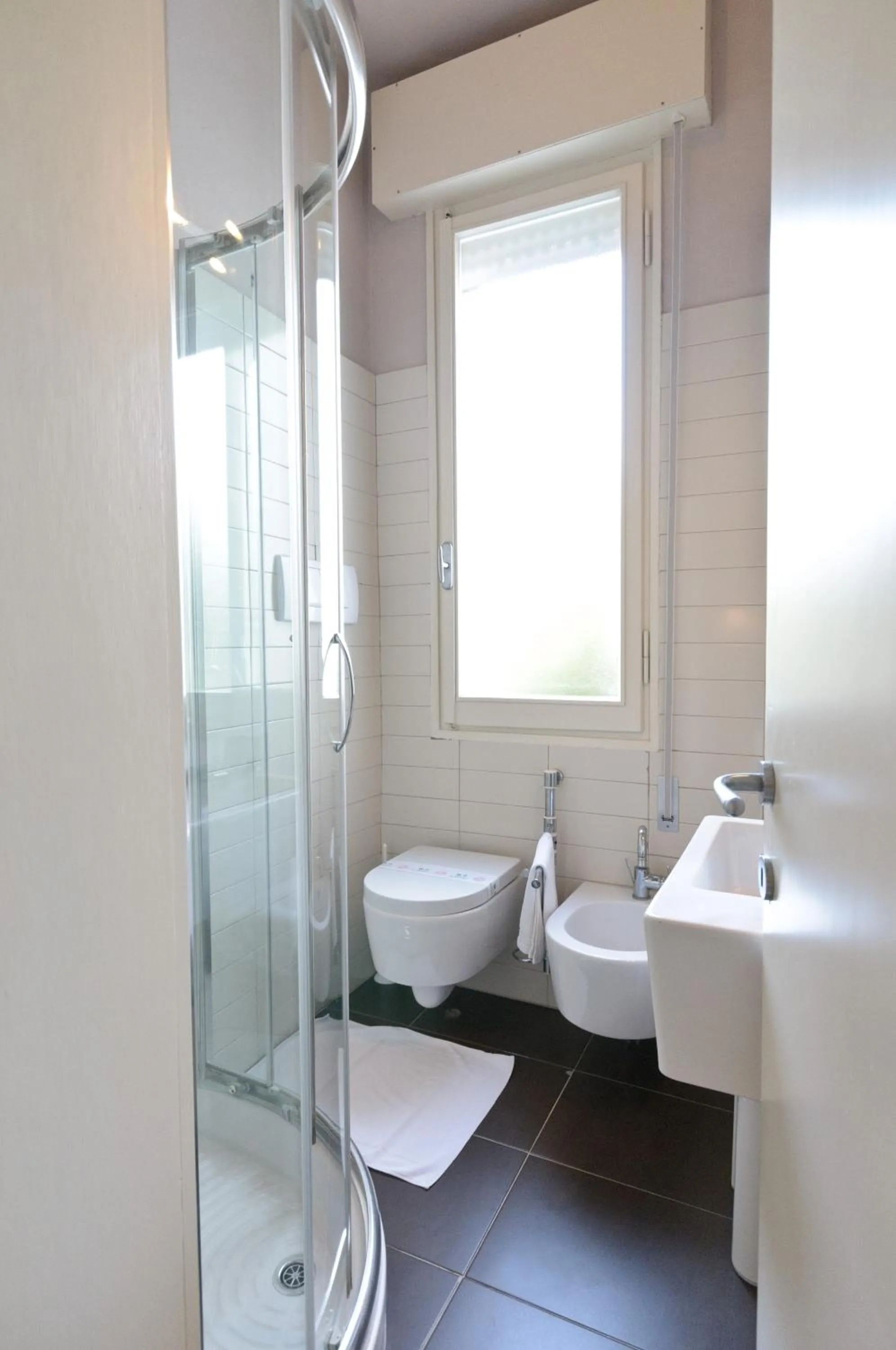 Bathroom in HOTEL TRIONFAL - Fronte Mare - Vicinissimi al Centro