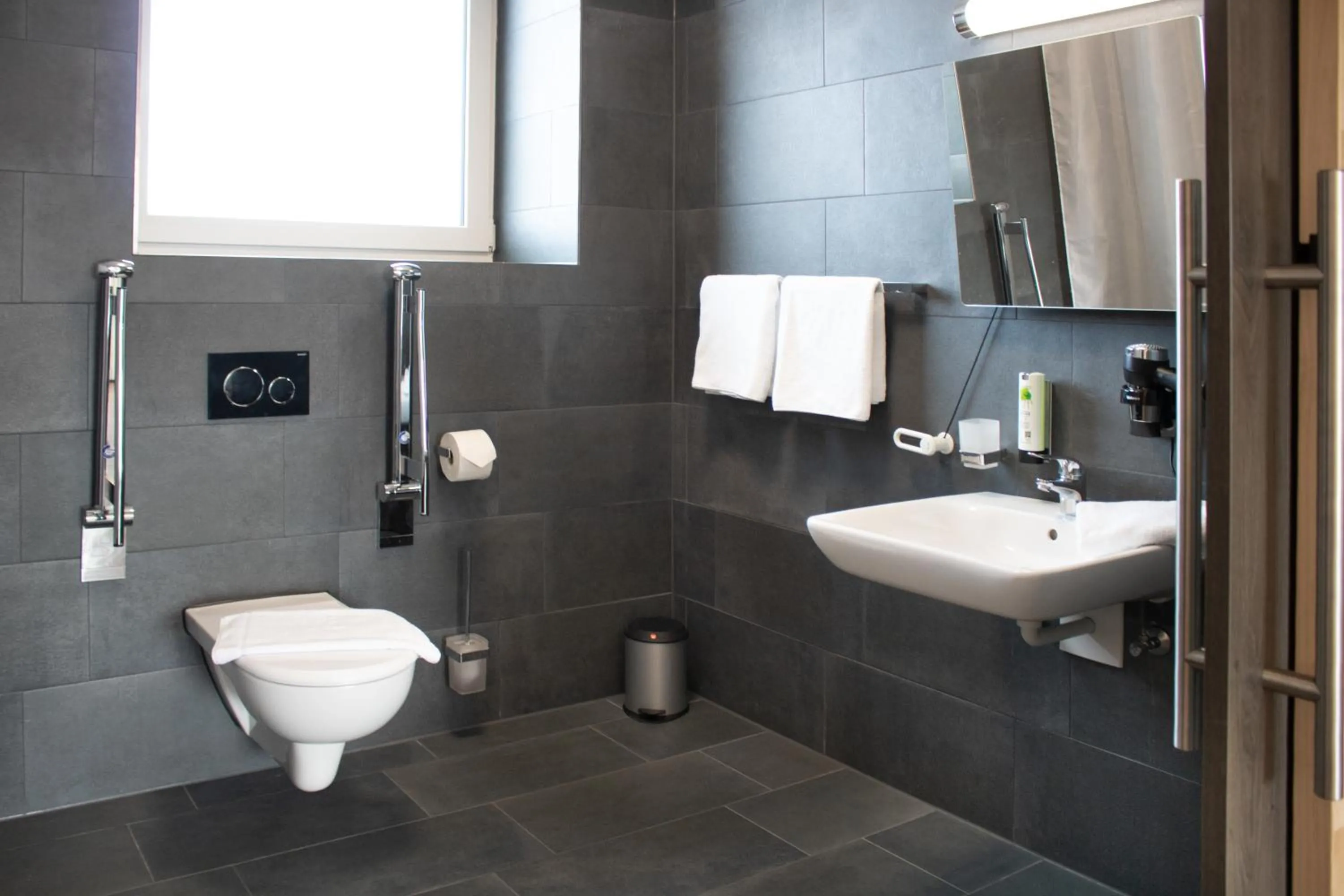 Bathroom in ING Hotel by WMM Hotels