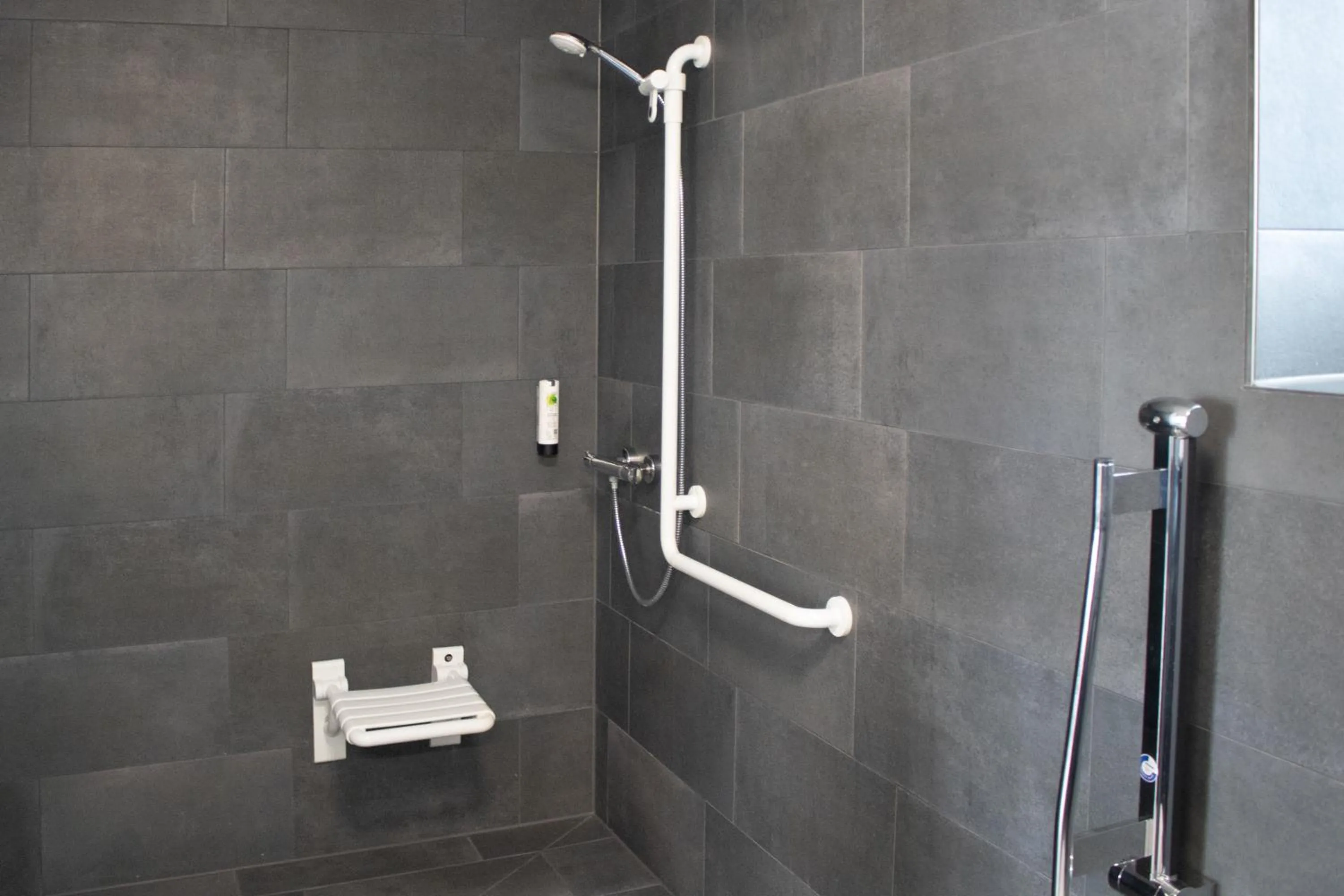 Bathroom in ING Hotel by WMM Hotels