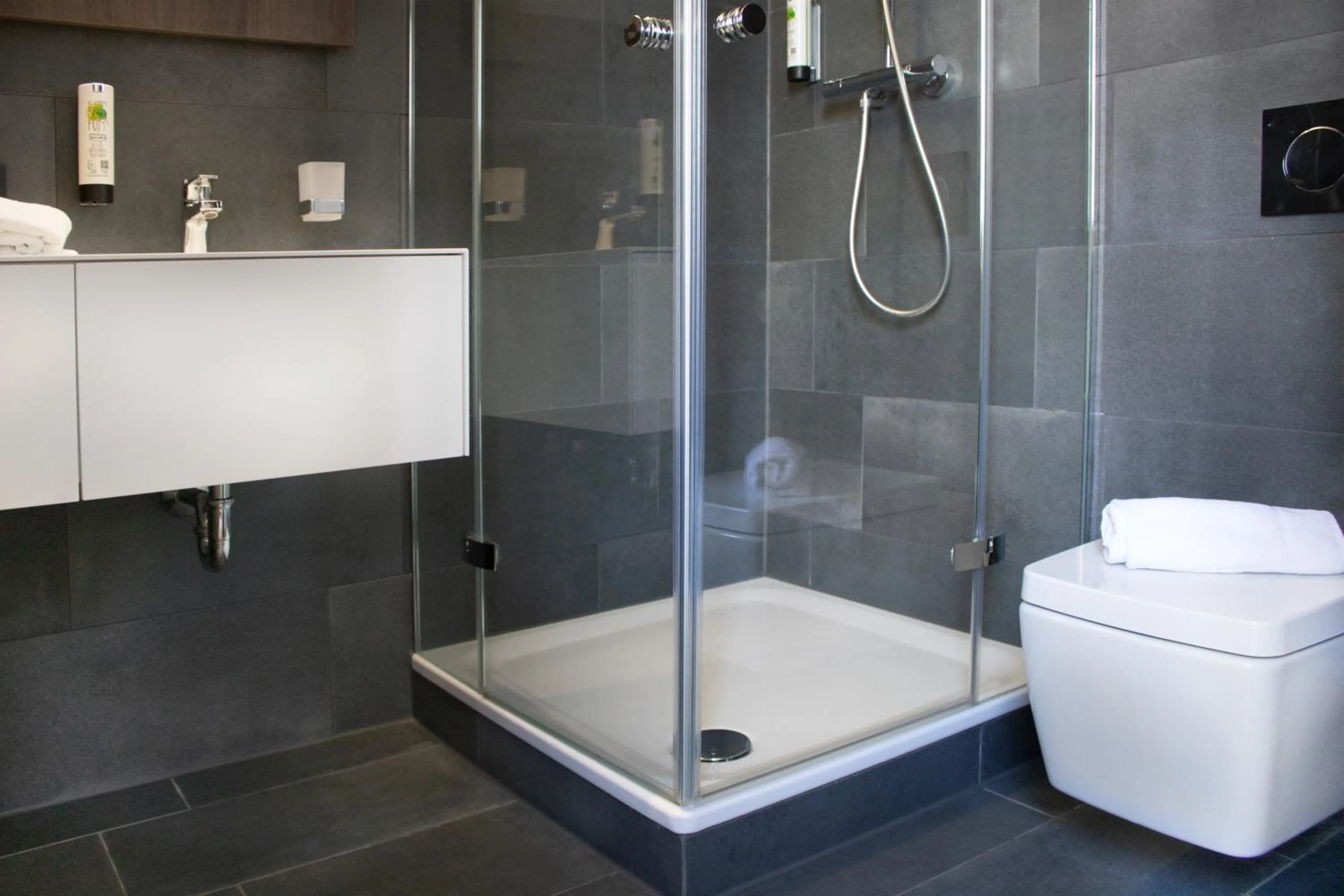 Bathroom in ING Hotel by WMM Hotels