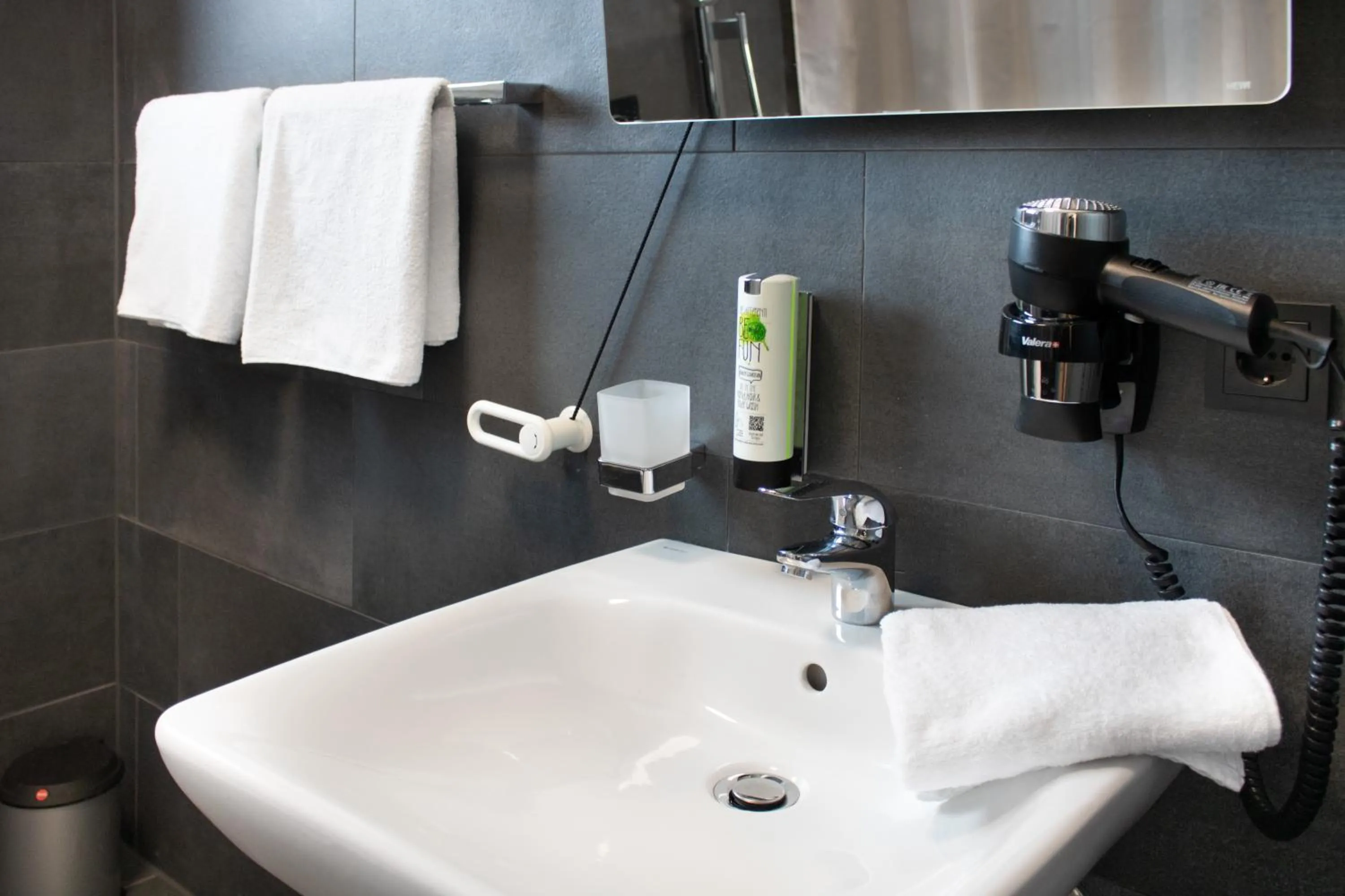 Bathroom in ING Hotel by WMM Hotels