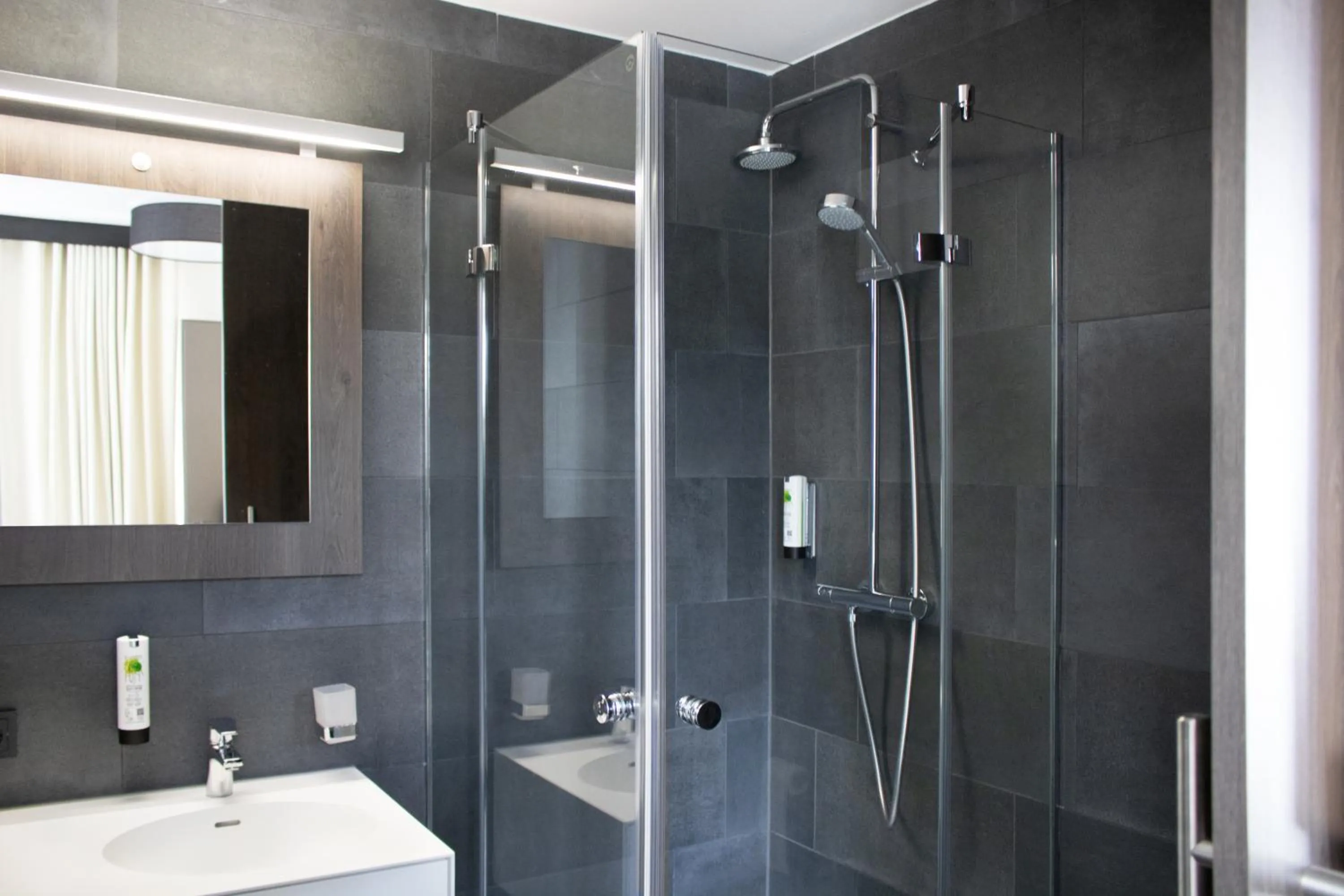 Bathroom in ING Hotel by WMM Hotels