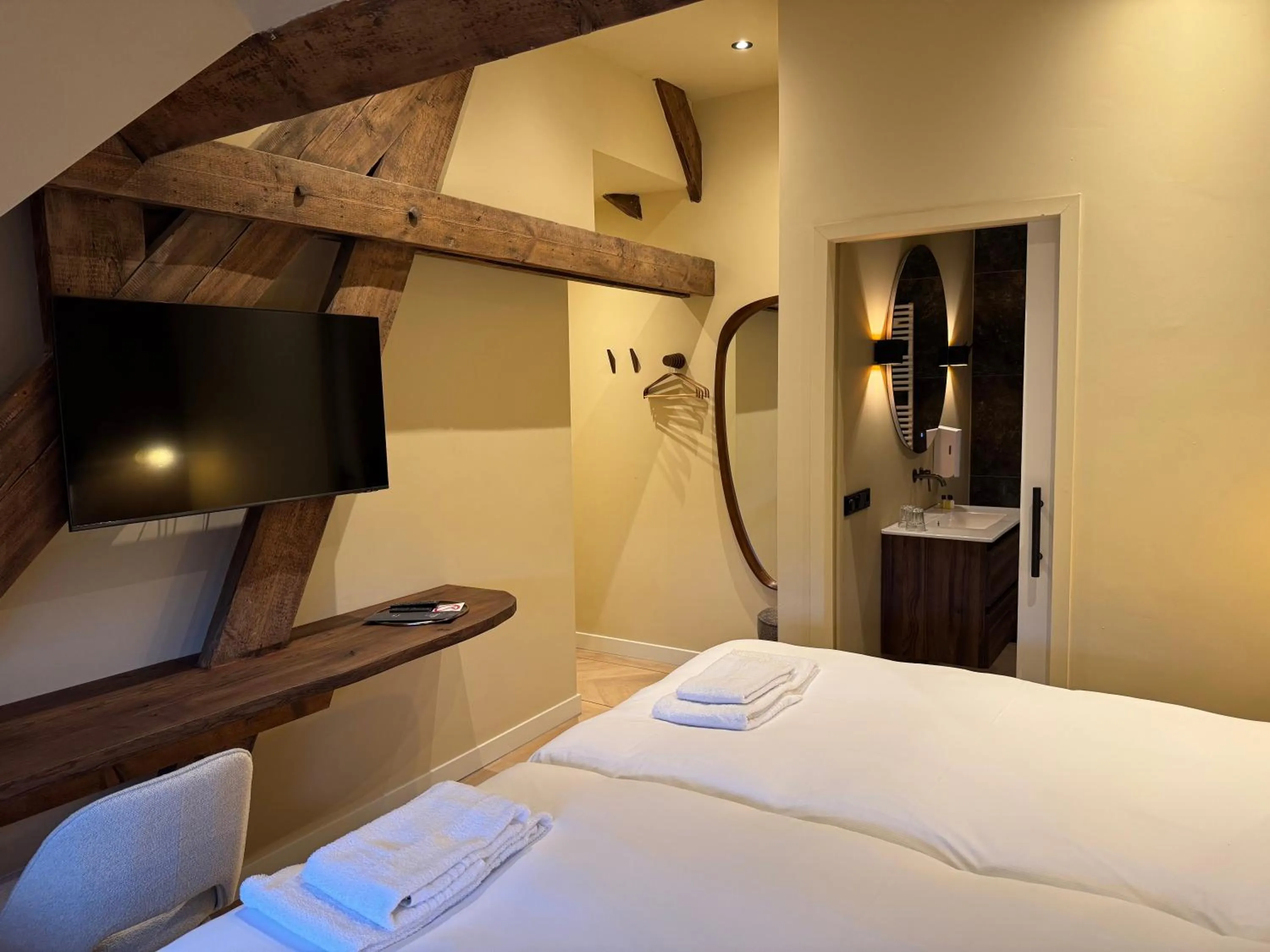 Bed in De Pastorie Bed & Breakfast