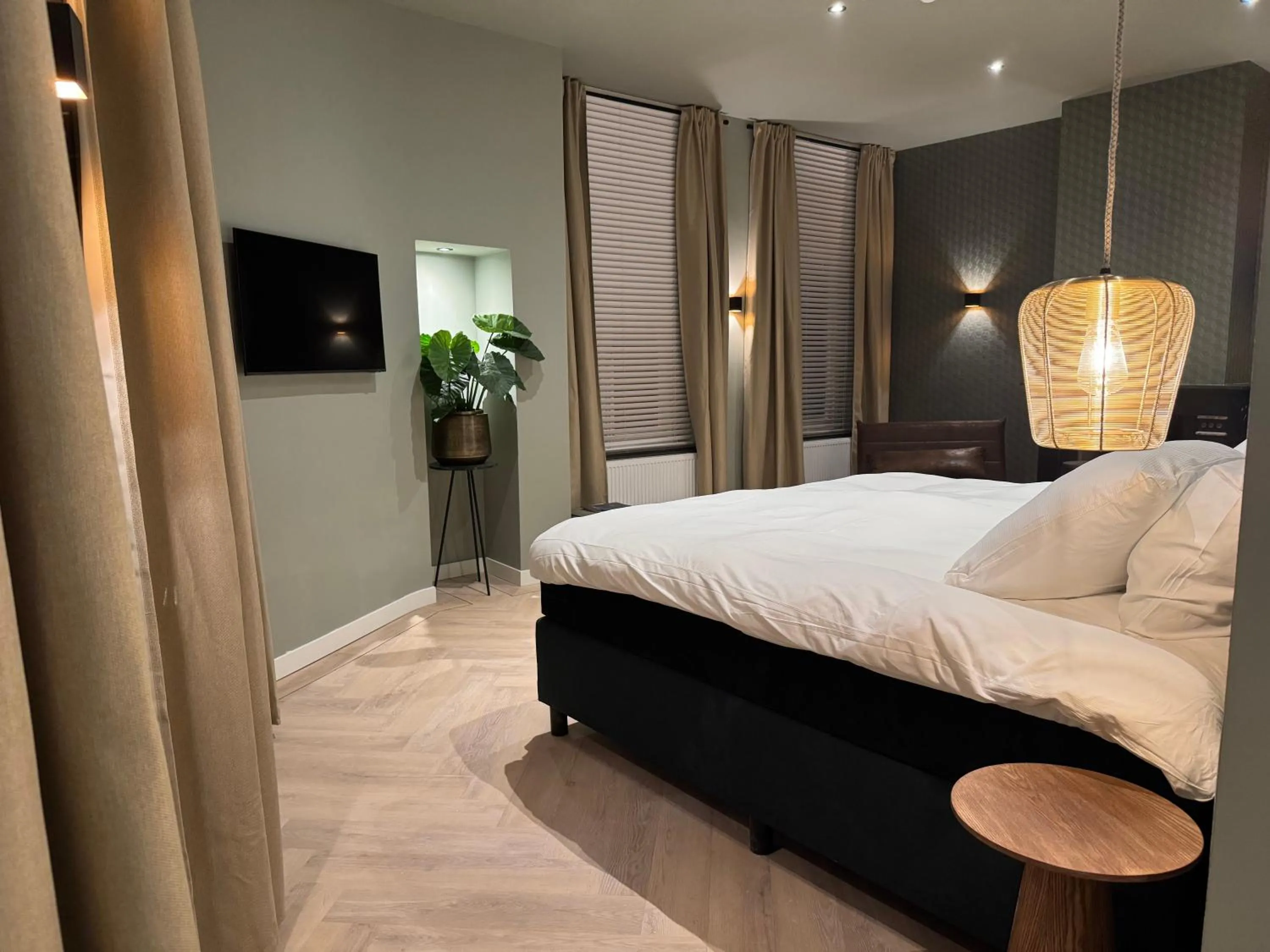 Bed in De Pastorie Bed & Breakfast