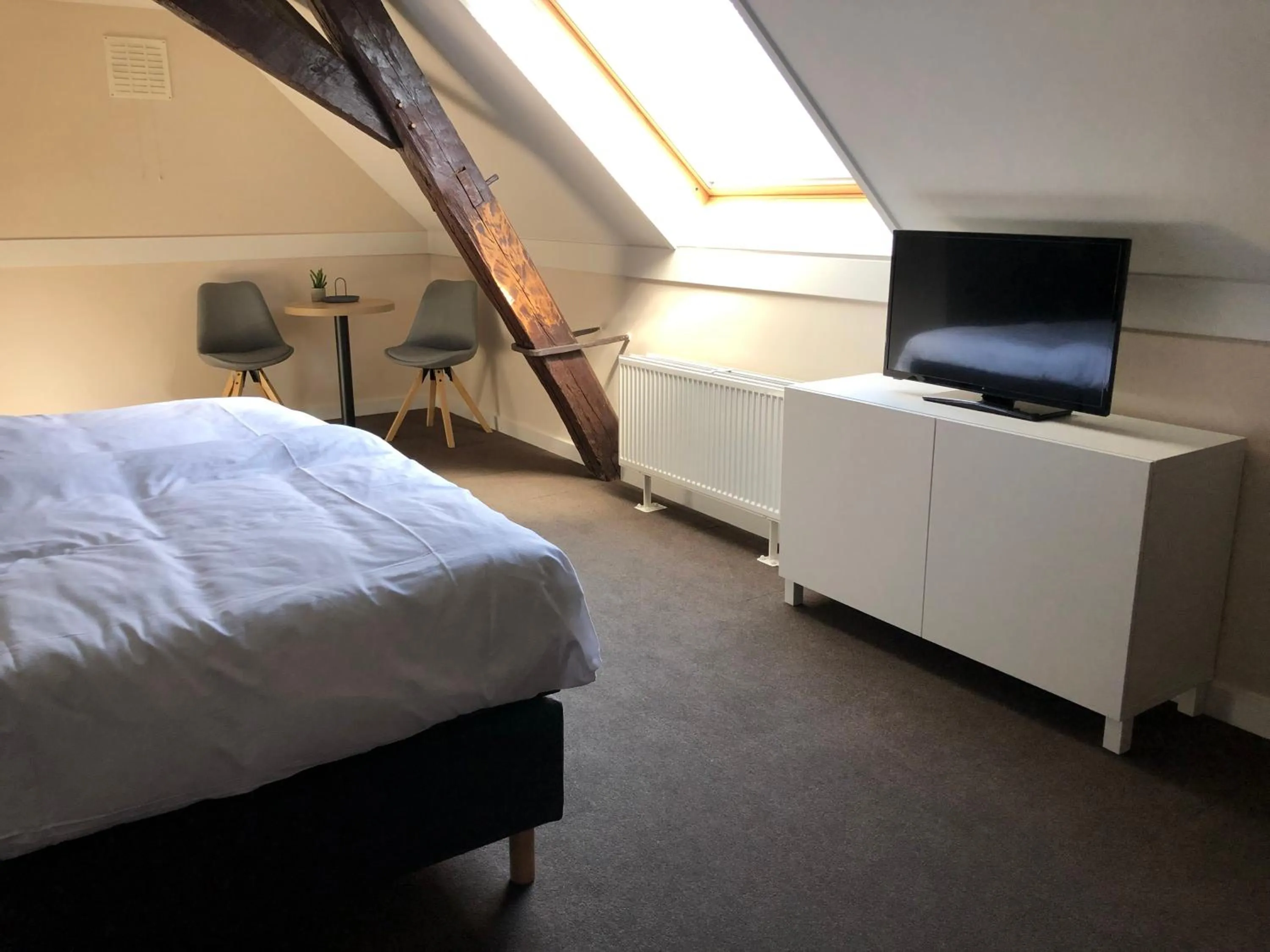 Bed in De Pastorie Bed & Breakfast