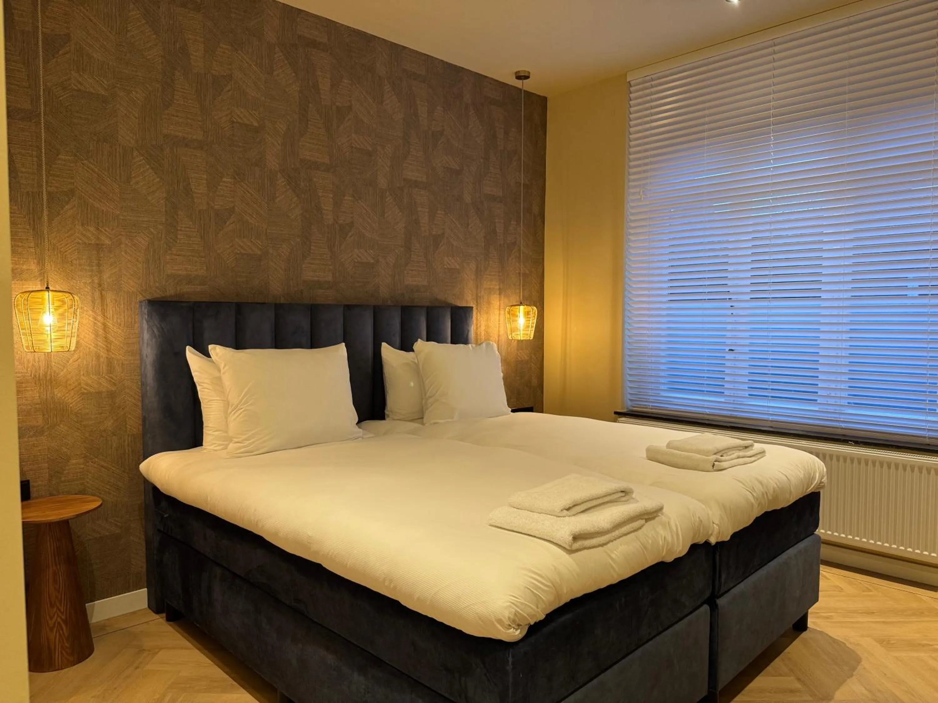 Bed in De Pastorie Bed & Breakfast