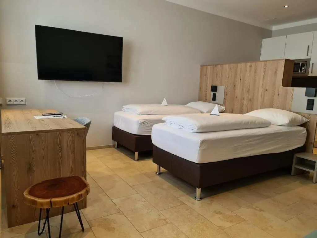 Bed in TT Aparthotel Neuhofen