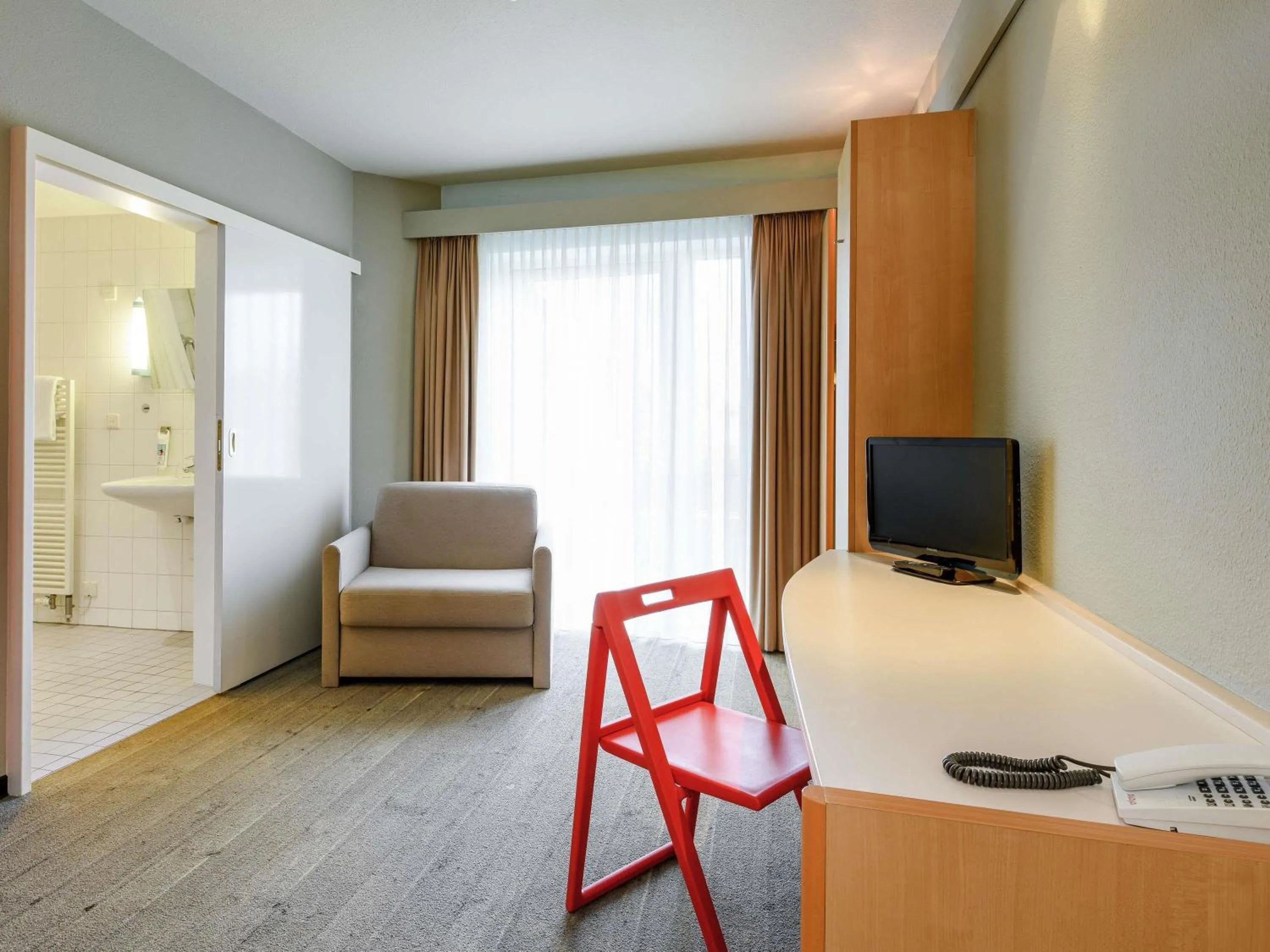 Bedroom in ibis Luebeck City
