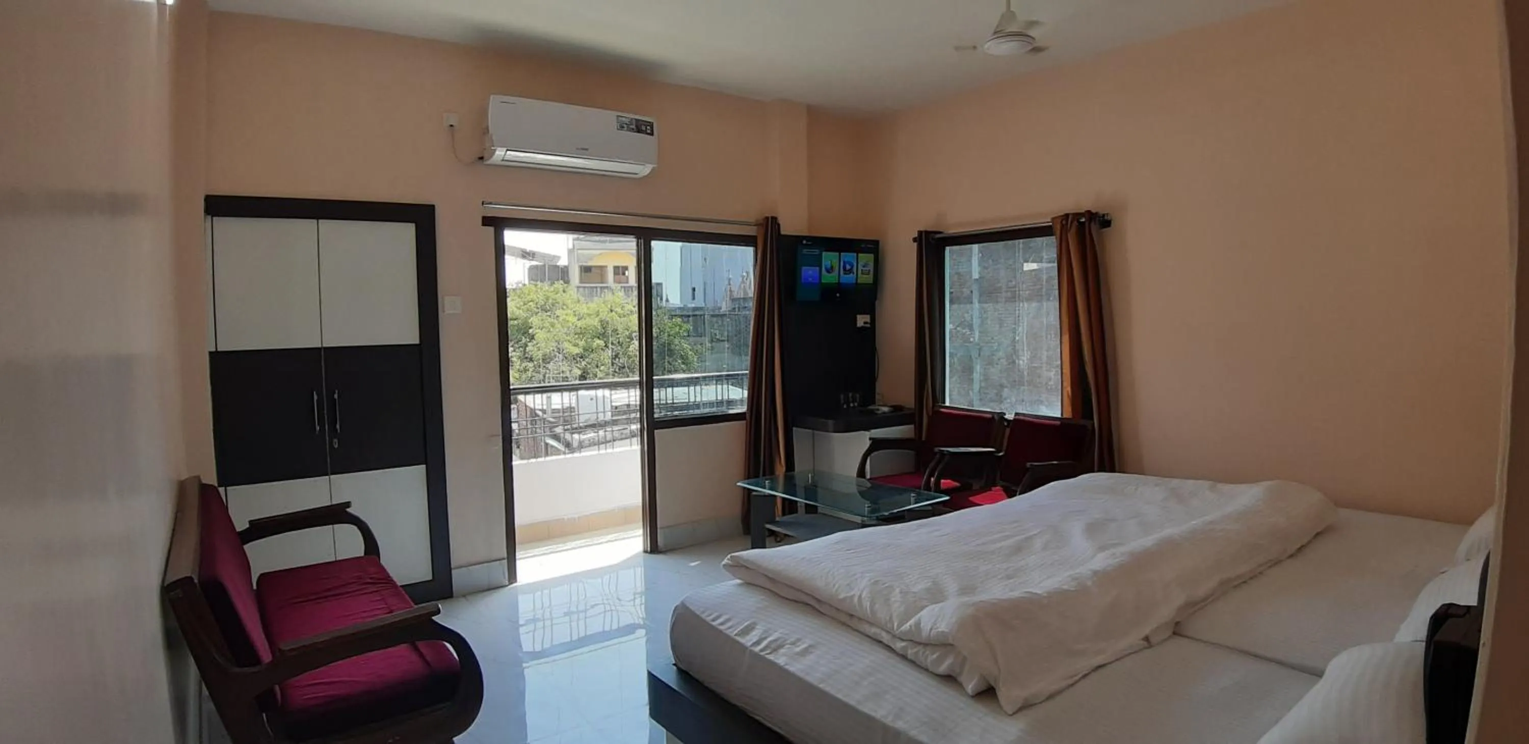 Photo of the whole room, Bed in Sita Inn Home Stay Away From Home By Hotel Sita Varanasi