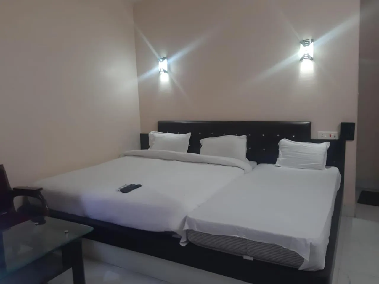 Photo of the whole room, Bed in Sita Inn Home Stay Away From Home By Hotel Sita Varanasi