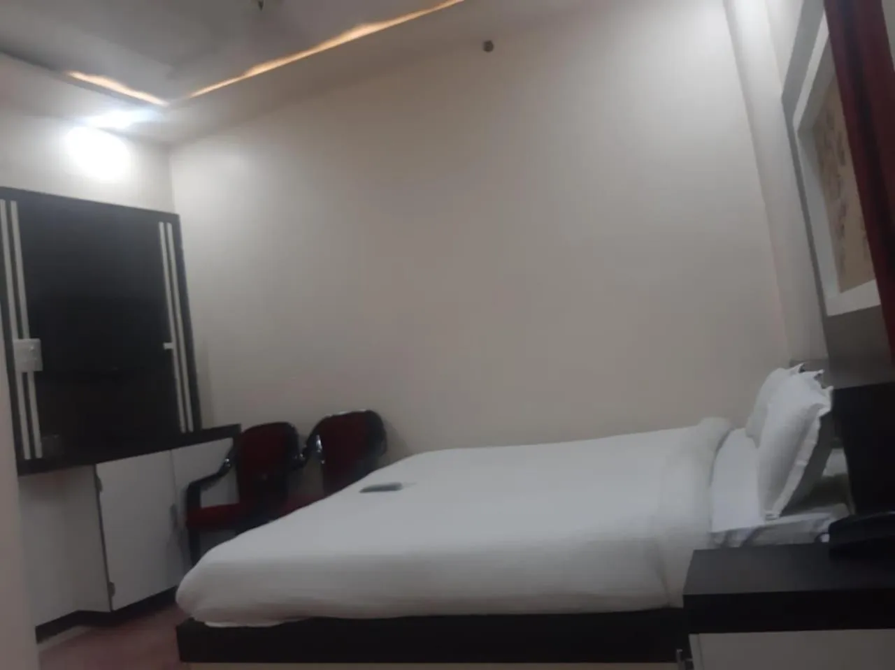 Photo of the whole room, Bed in Sita Inn Home Stay Away From Home By Hotel Sita Varanasi