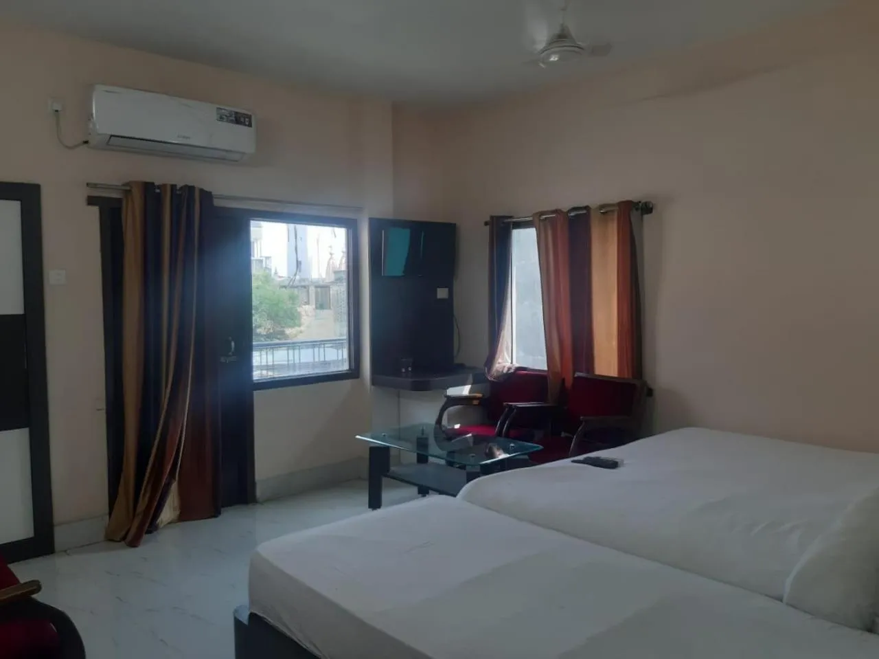 Photo of the whole room, Bed in Sita Inn Home Stay Away From Home By Hotel Sita Varanasi