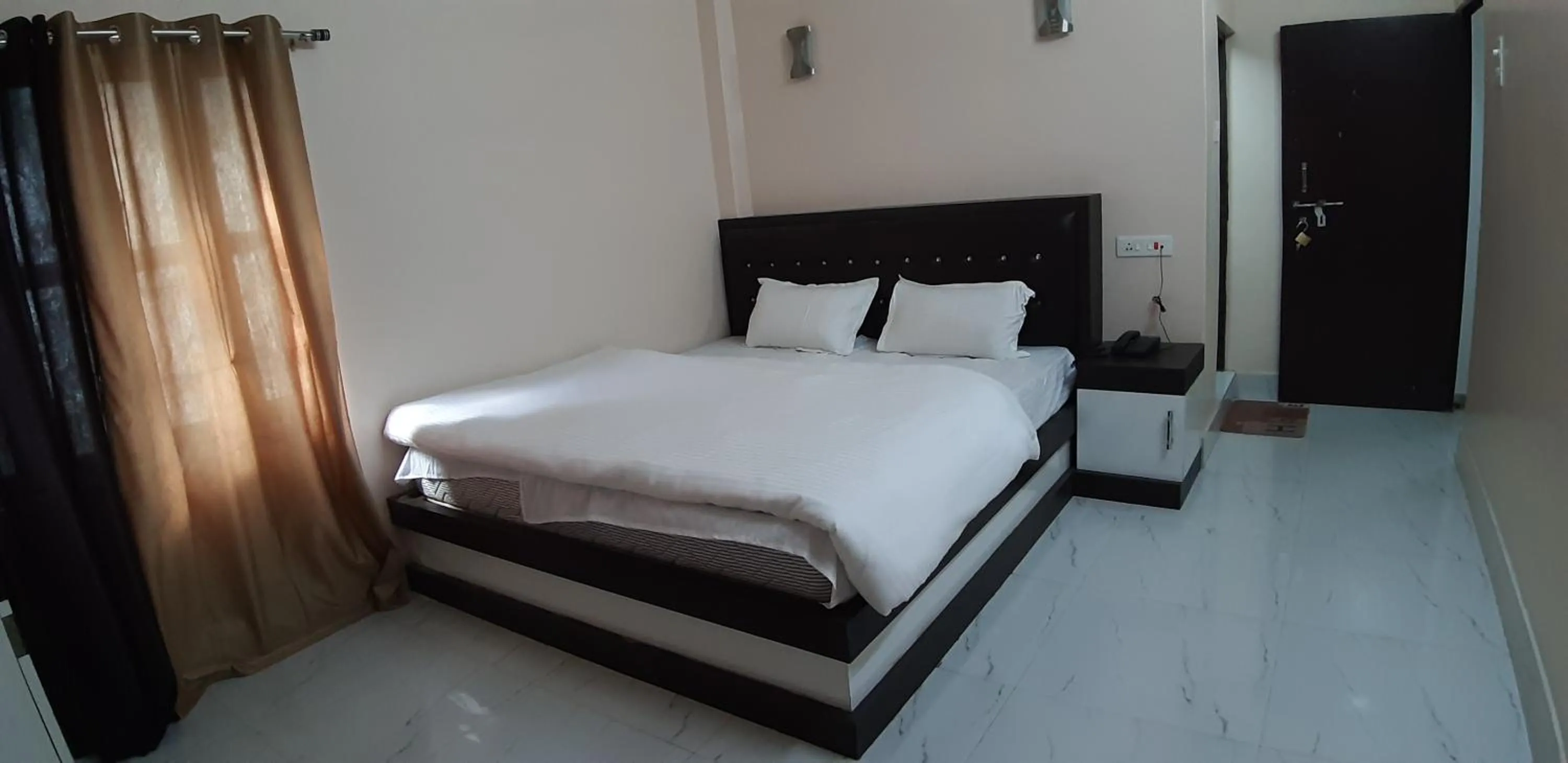 Photo of the whole room, Bed in Sita Inn Home Stay Away From Home By Hotel Sita Varanasi