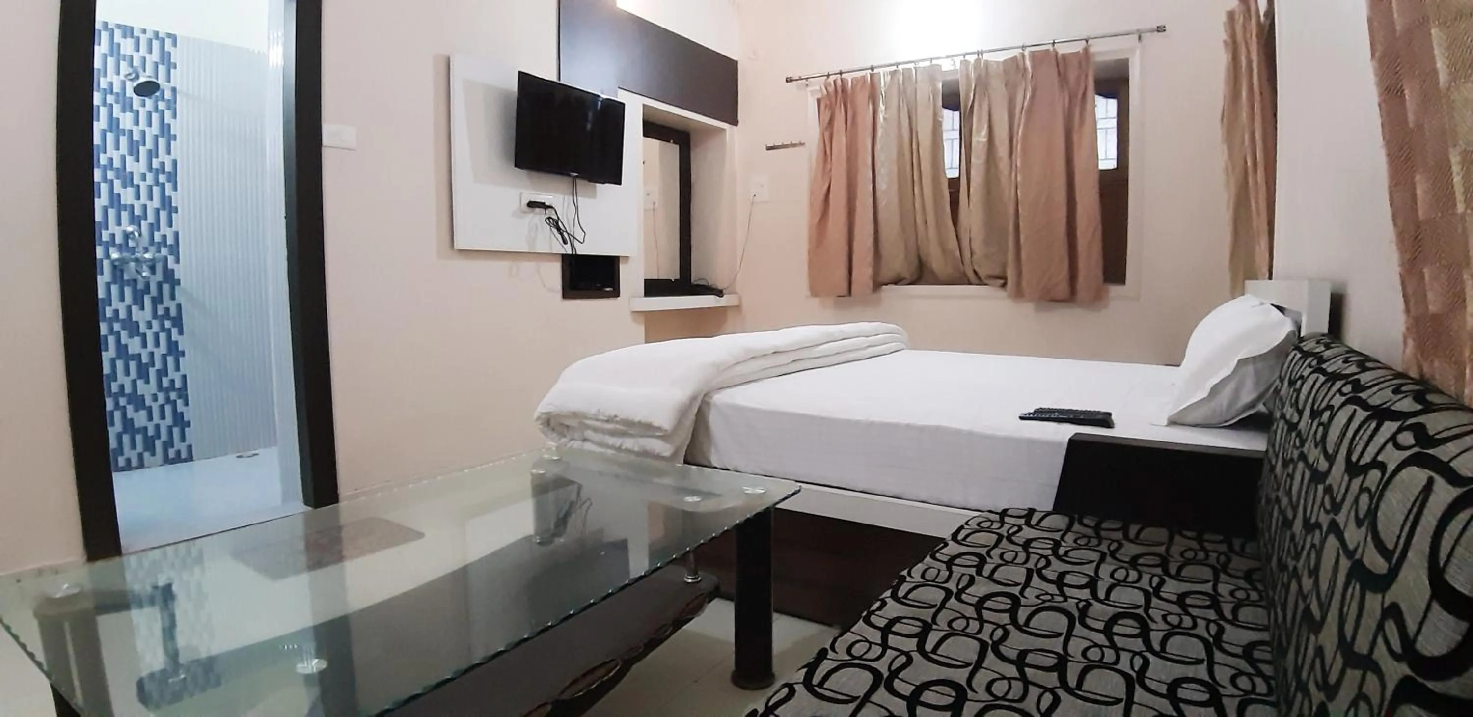 Photo of the whole room, Bed in Sita Inn Home Stay Away From Home By Hotel Sita Varanasi
