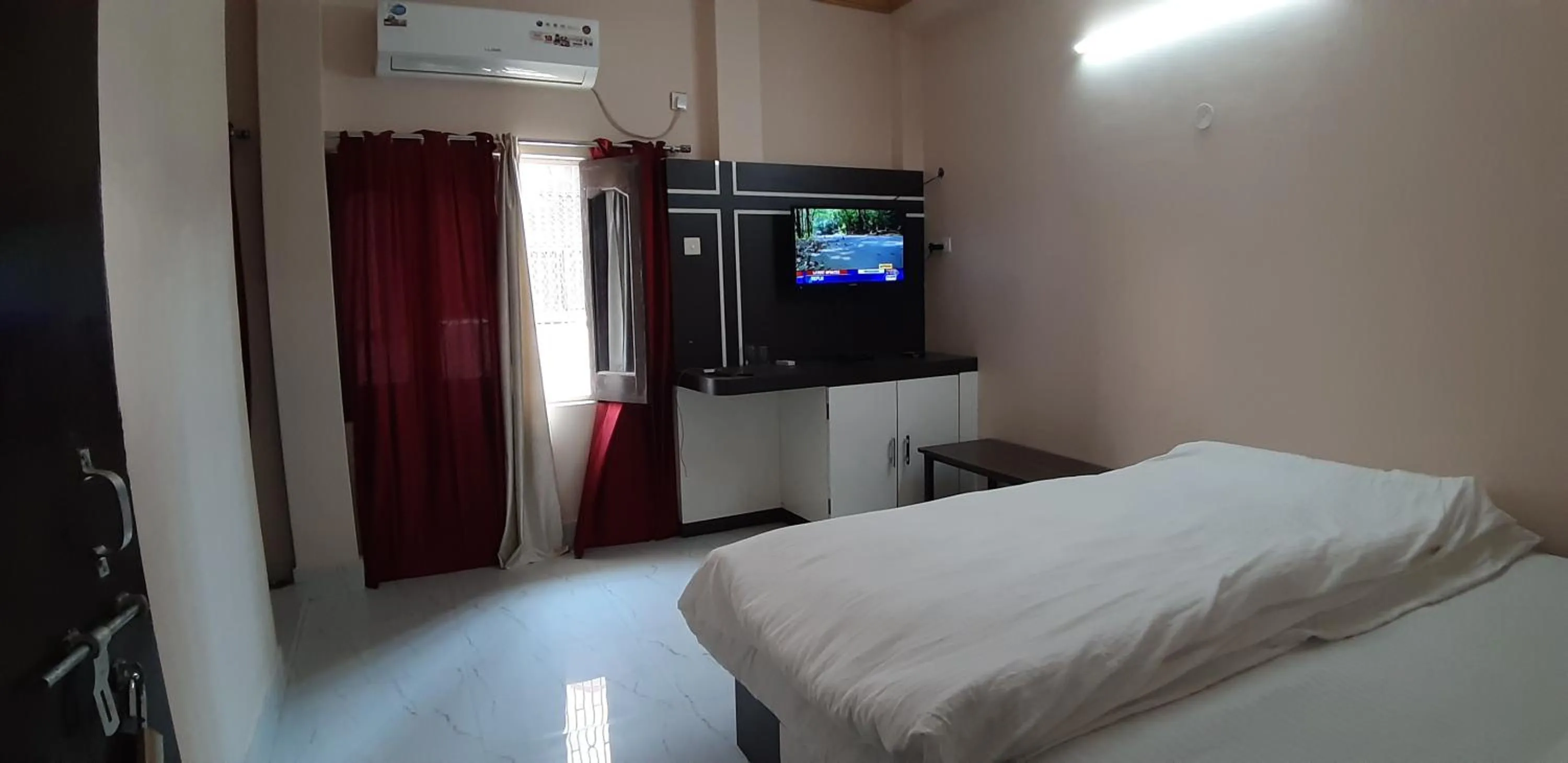 Photo of the whole room, Bed in Sita Inn Home Stay Away From Home By Hotel Sita Varanasi