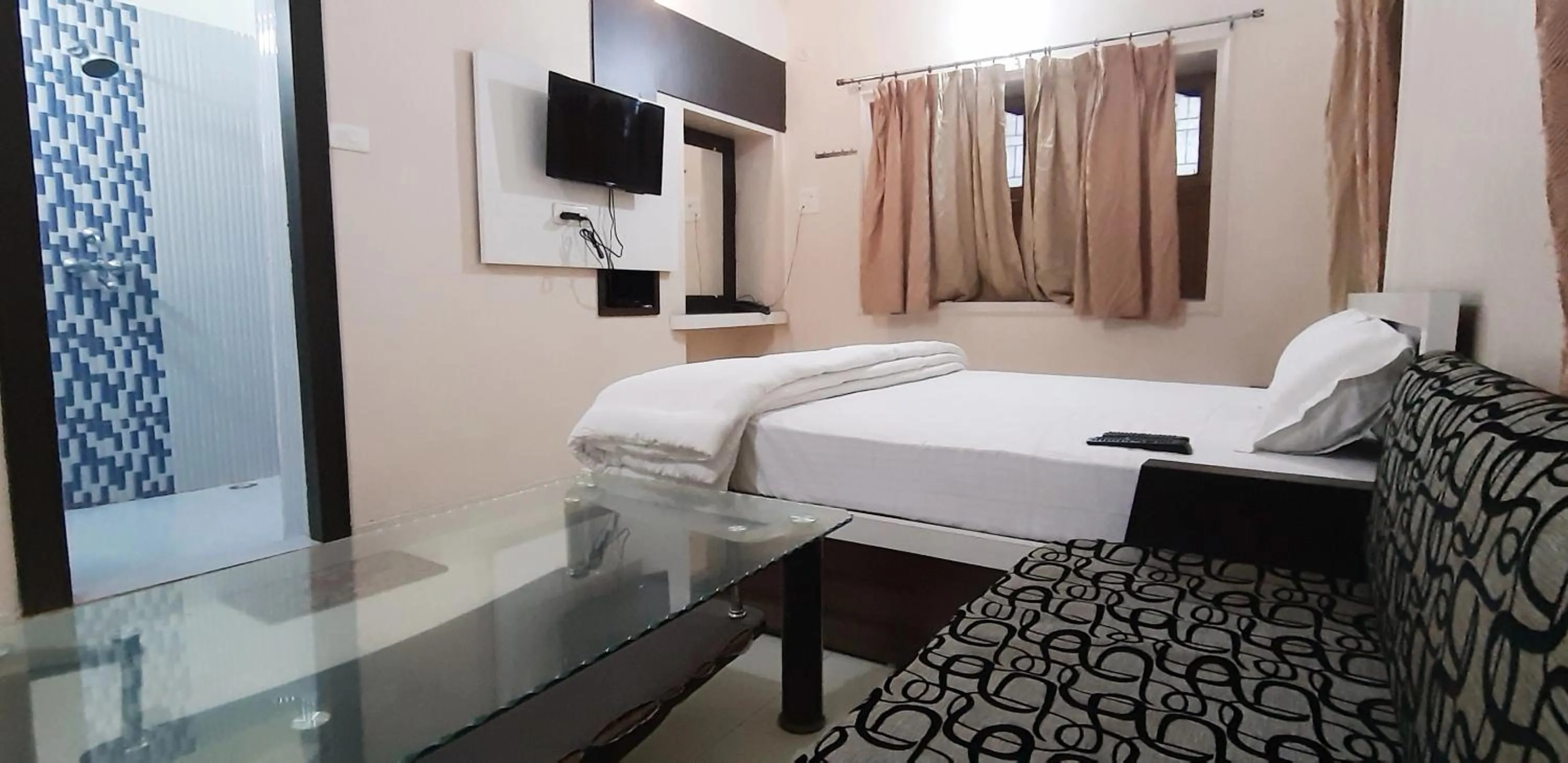 Photo of the whole room, Bed in Sita Inn Home Stay Away From Home By Hotel Sita Varanasi