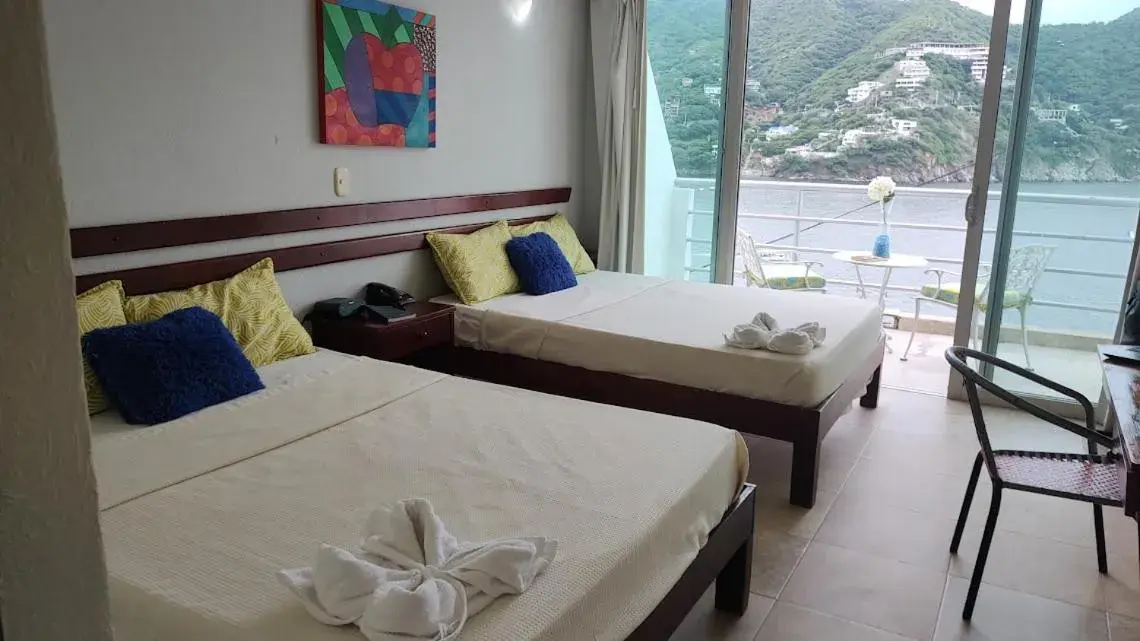 Deluxe Double Room with Balcony and Sea View in Hotel Bahia Taganga Deluxe Double Room with Balcony and Sea View in Hotel Bahia Taganga