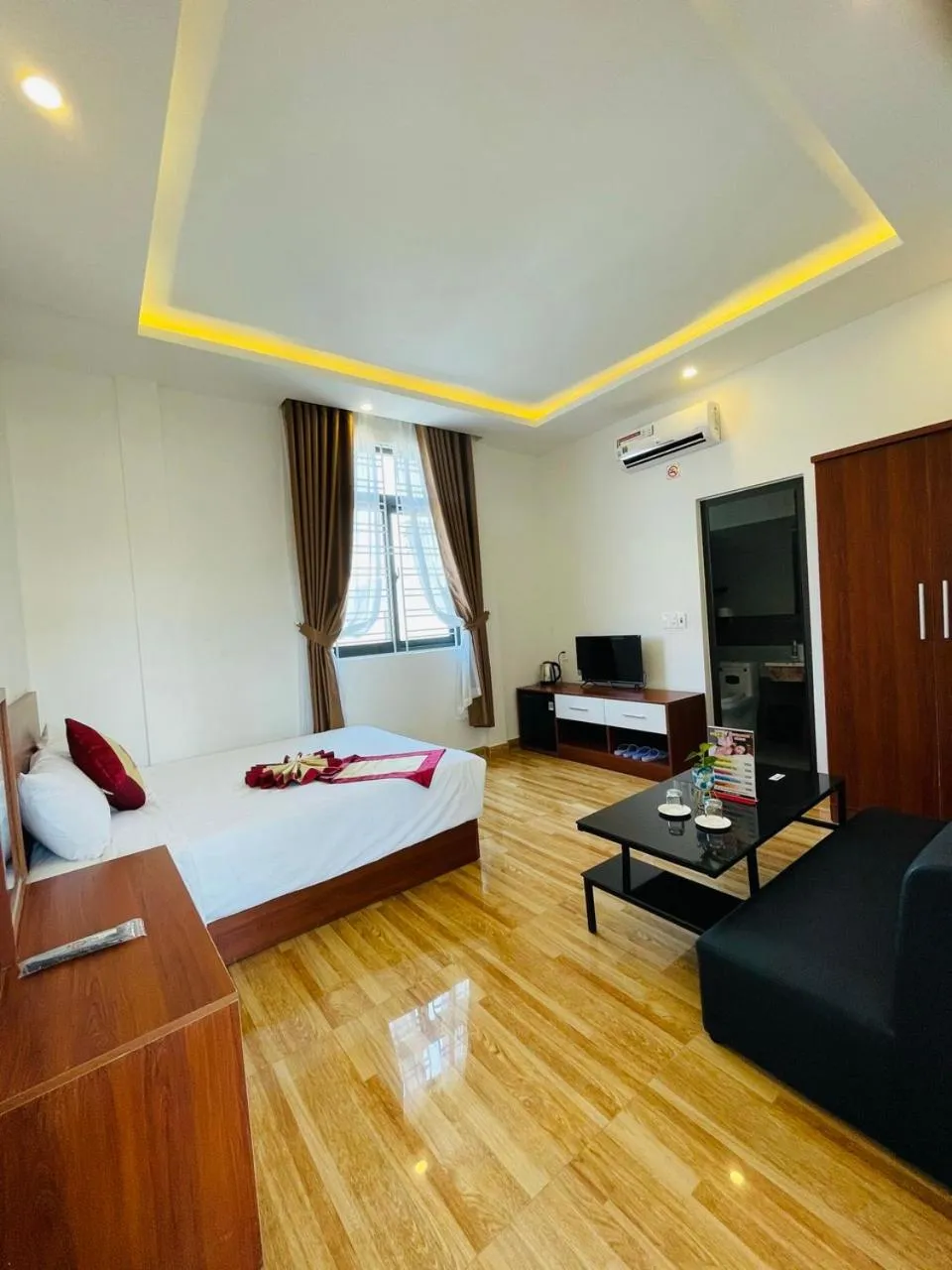 Photo of the whole room, Bed in Sapphire Hotel Hue