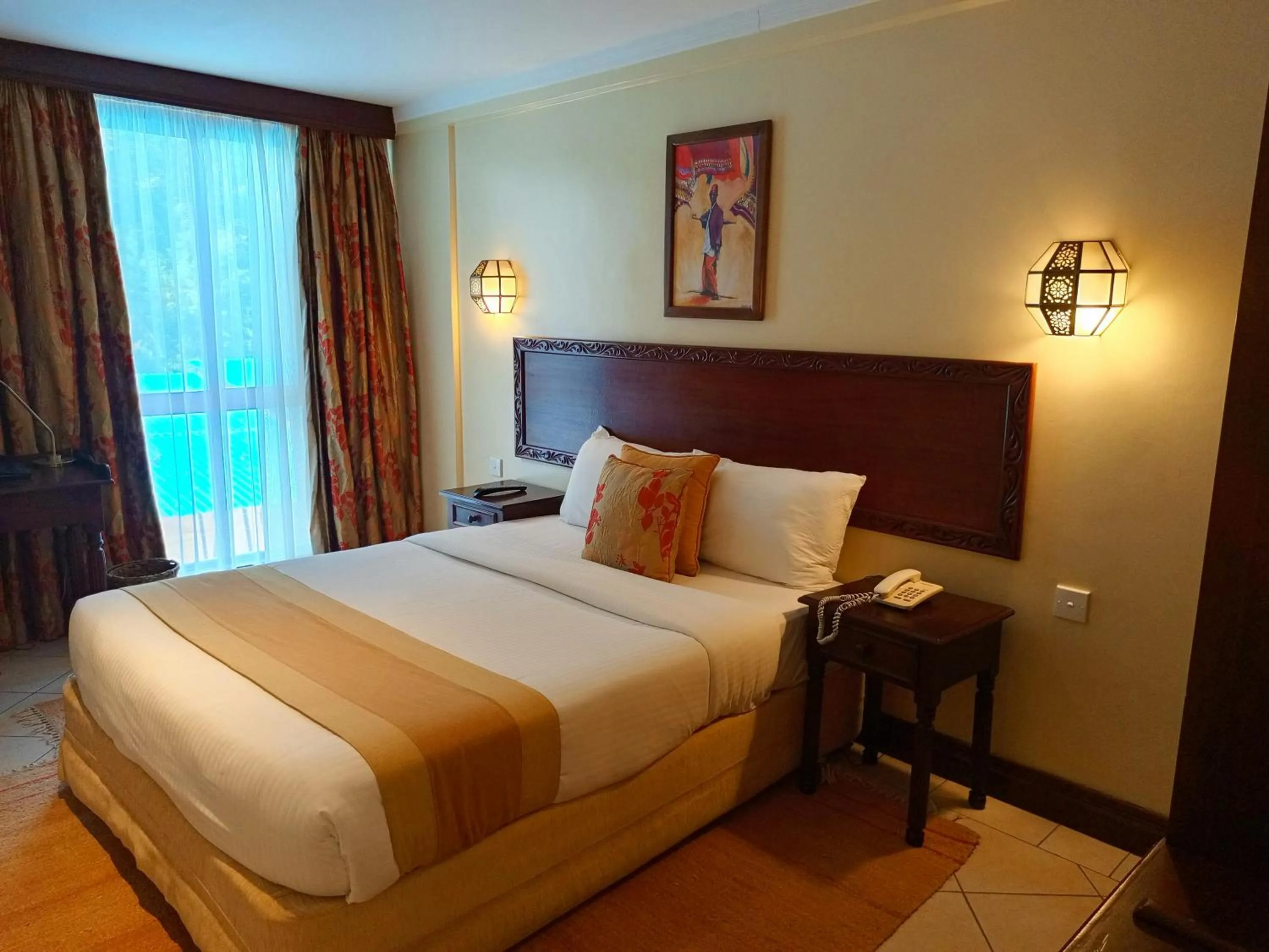 Bed in The Heron By Sarovar Portico India