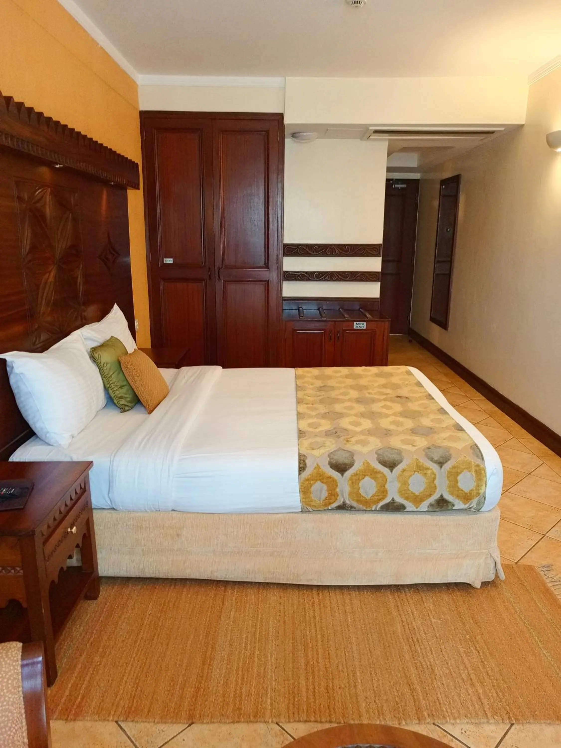Bed in The Heron By Sarovar Portico India