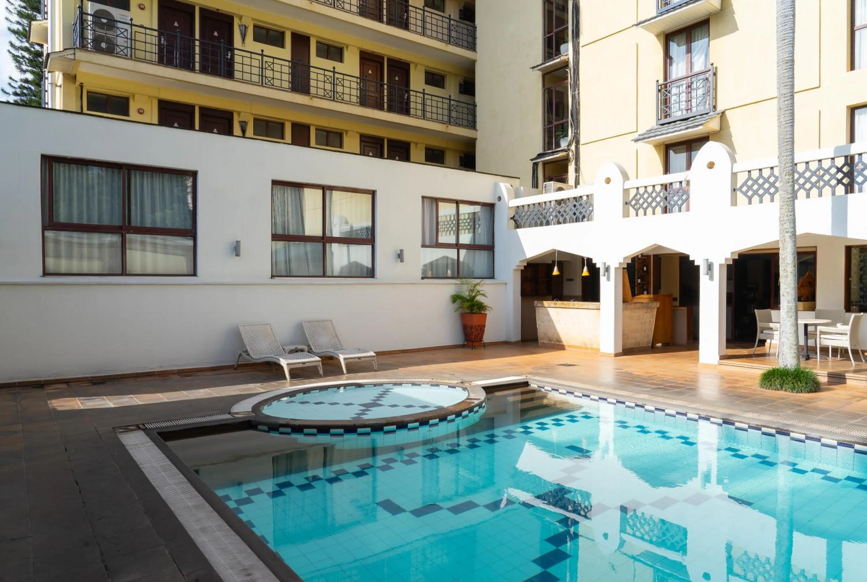 Swimming pool in The Heron By Sarovar Portico India