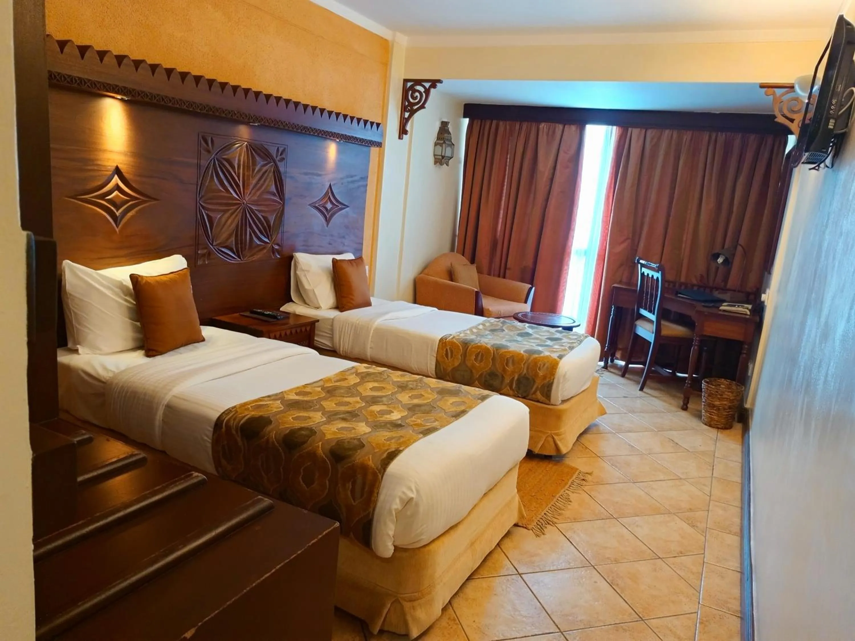 Bed in The Heron By Sarovar Portico India