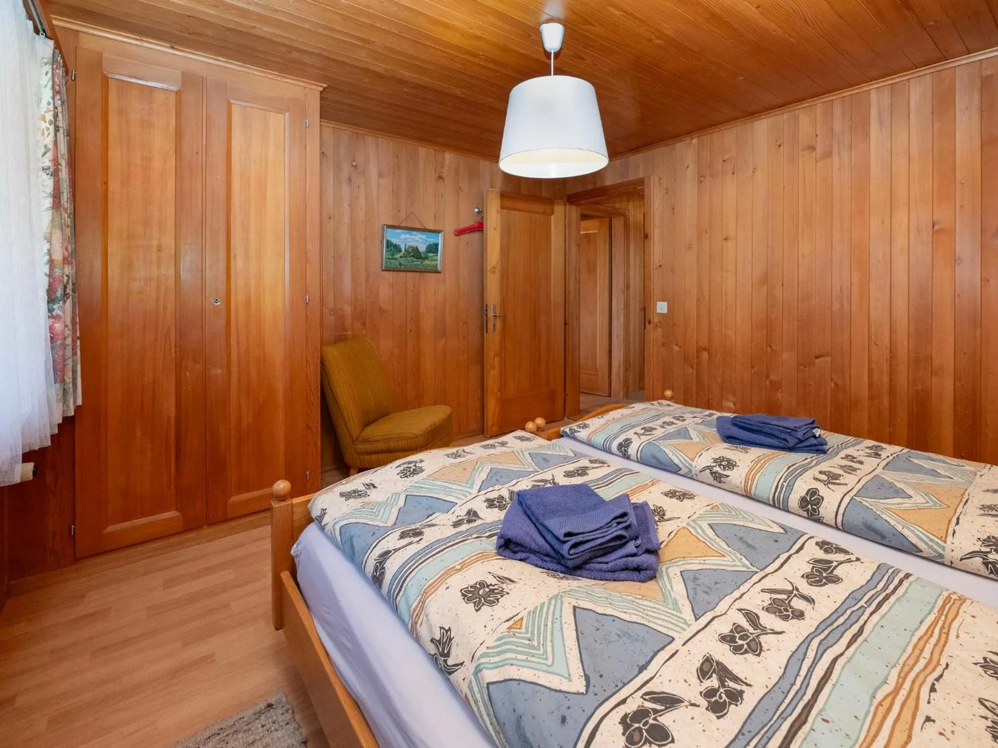 Bedroom, Bed in Apartment Chalet Spassvogel by Interhome