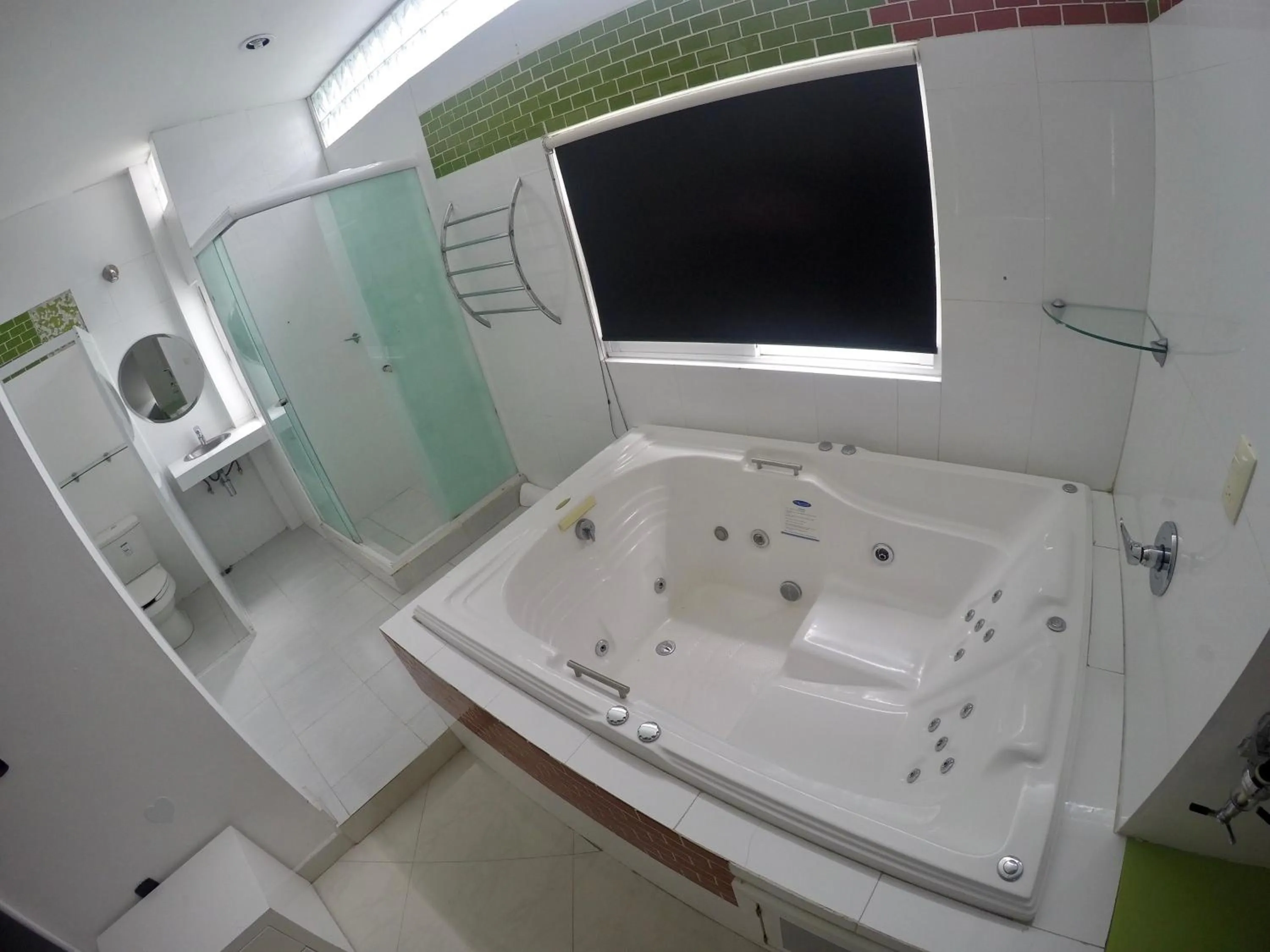 Bathroom in Hotel Maragreens