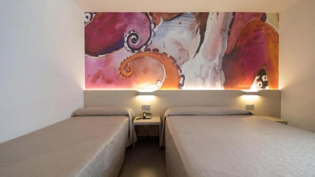 Bed in Hotel Riviera