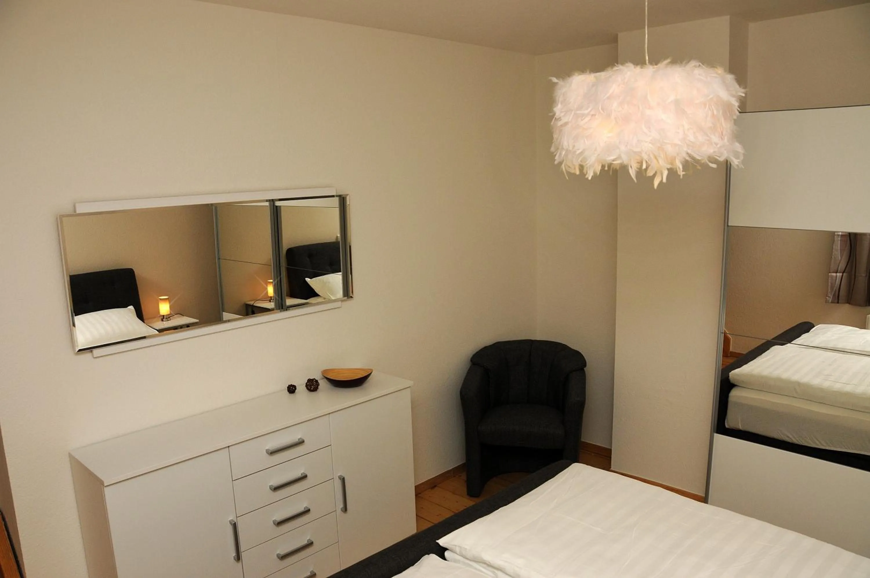 Photo of the whole room, Bed in Apartments am Brunnen