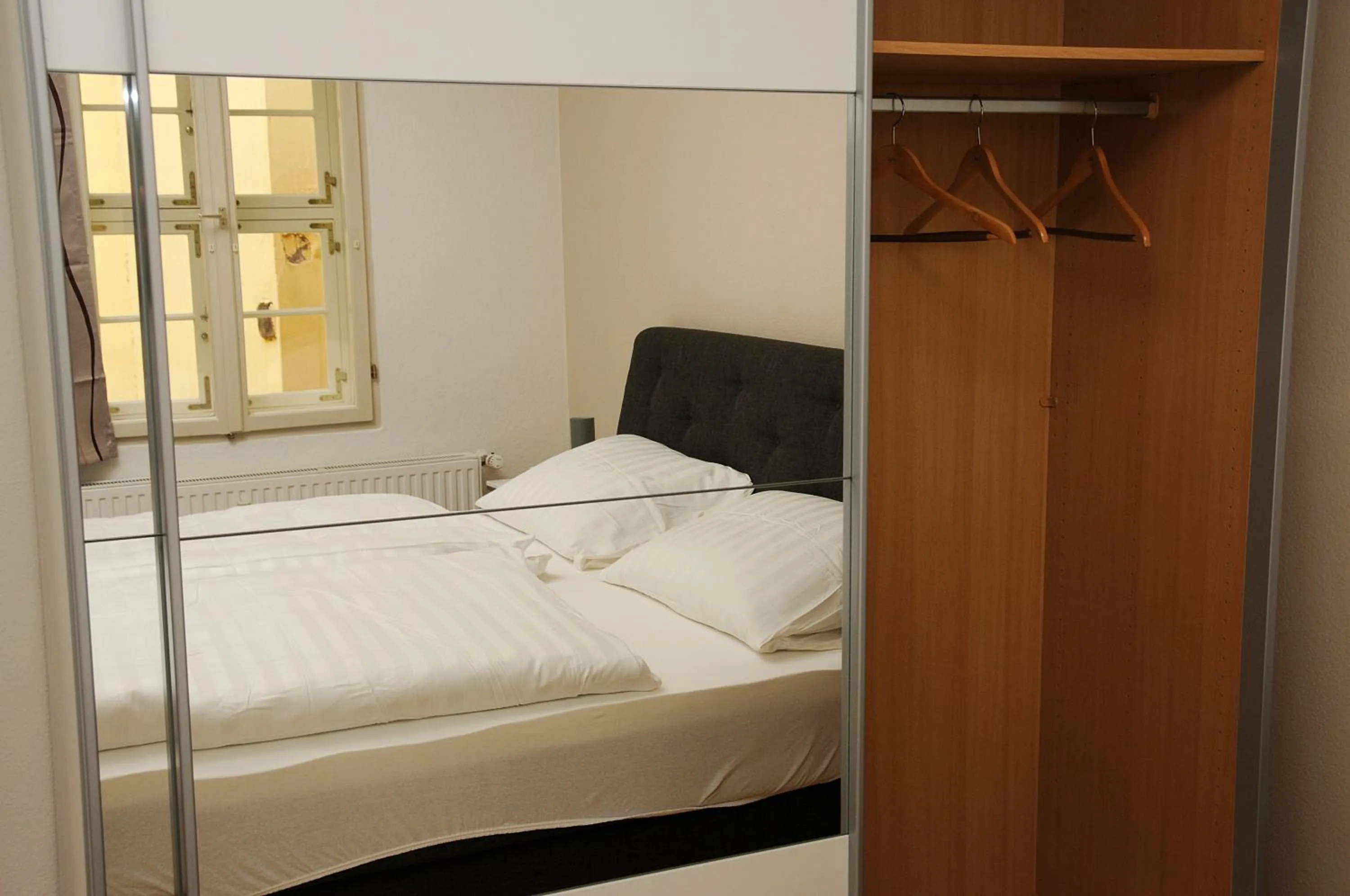 Bed in Apartments am Brunnen