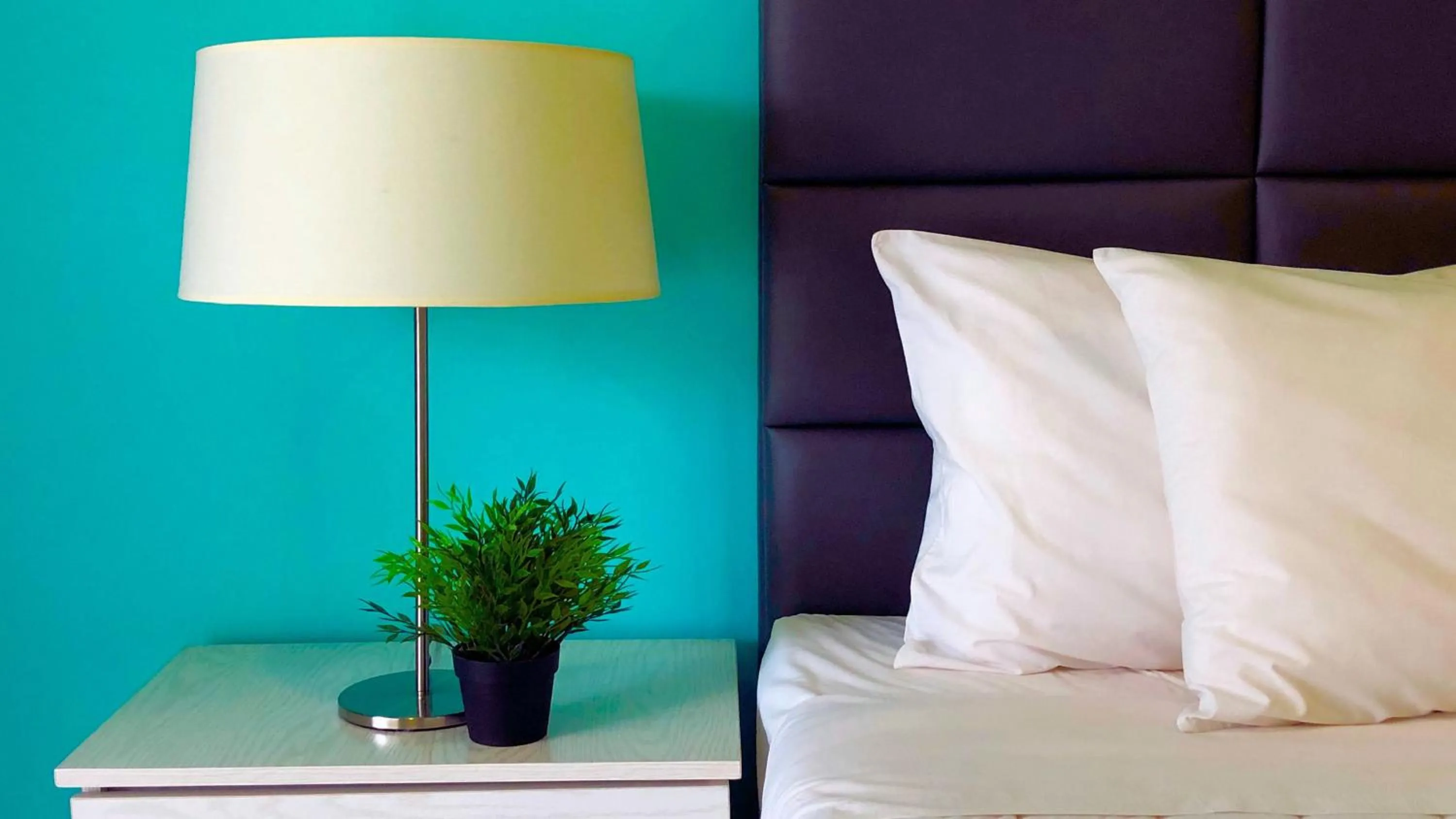 Bed in Quints Travelers Inn