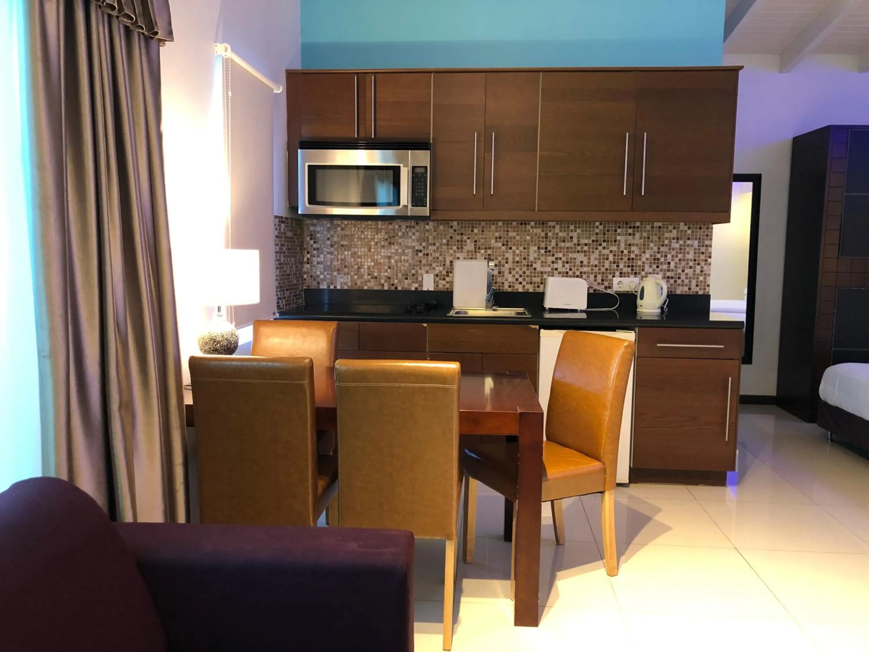 Kitchen or kitchenette in Quints Travelers Inn