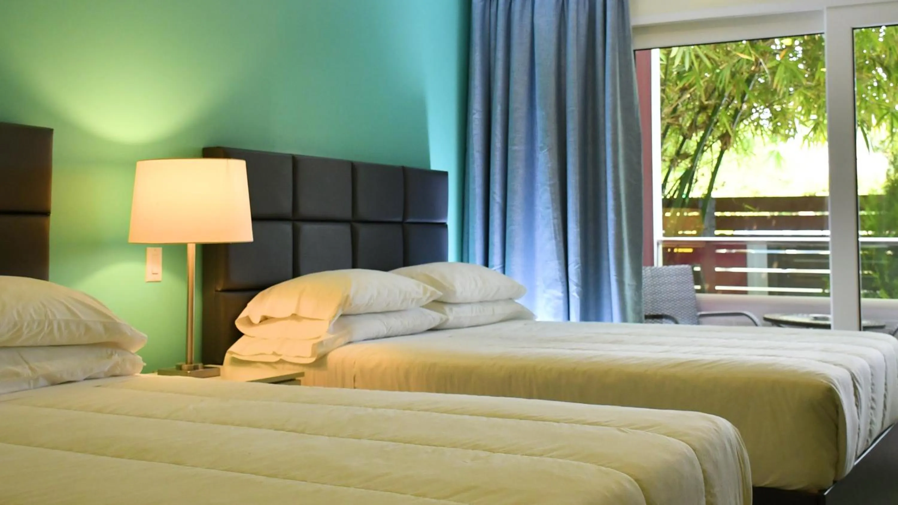 Bed in Quints Travelers Inn